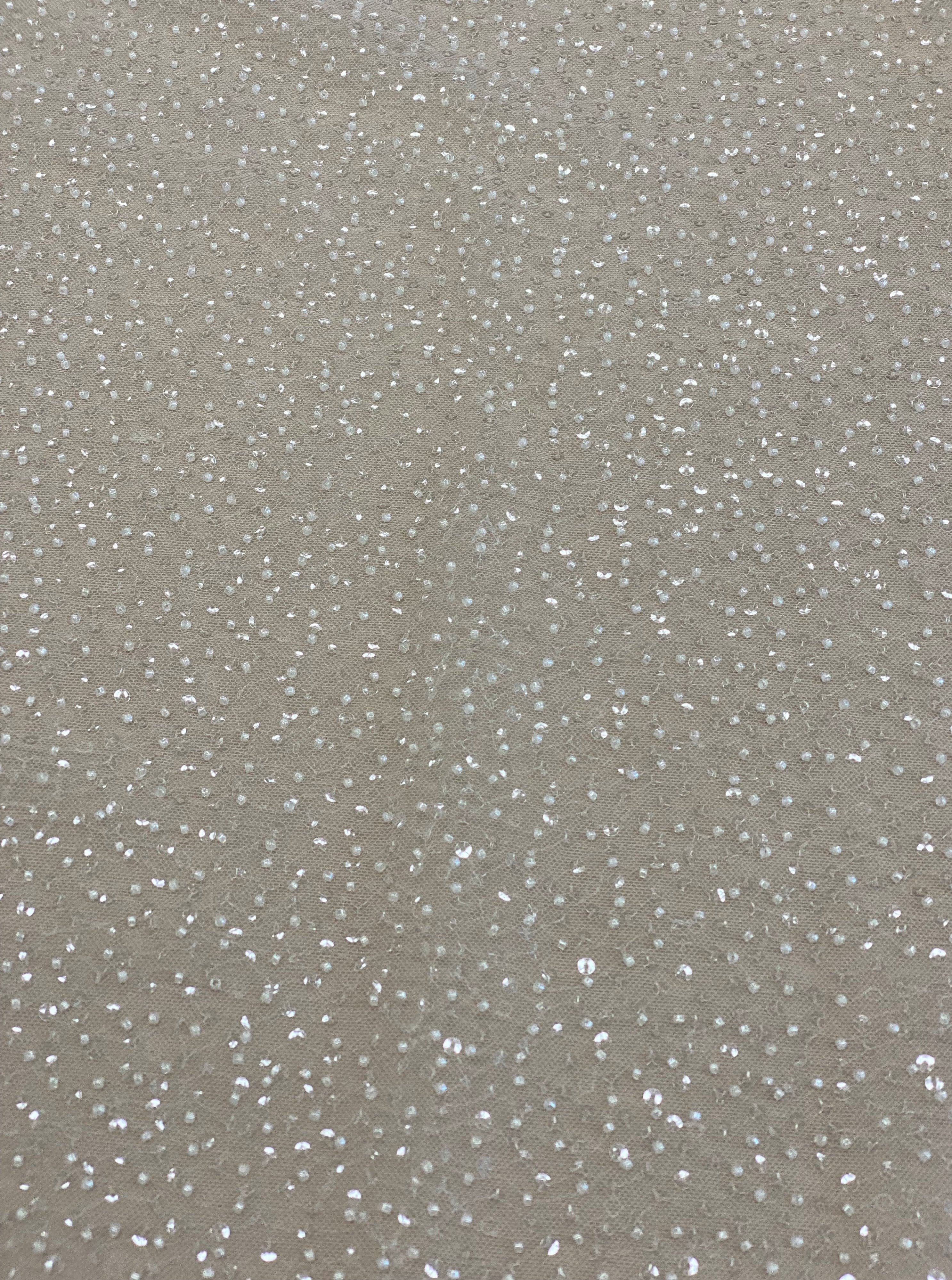 Ivory Sequin Tulle — featuring hand-beading and sequins, 100% nylon, 110cm wide
