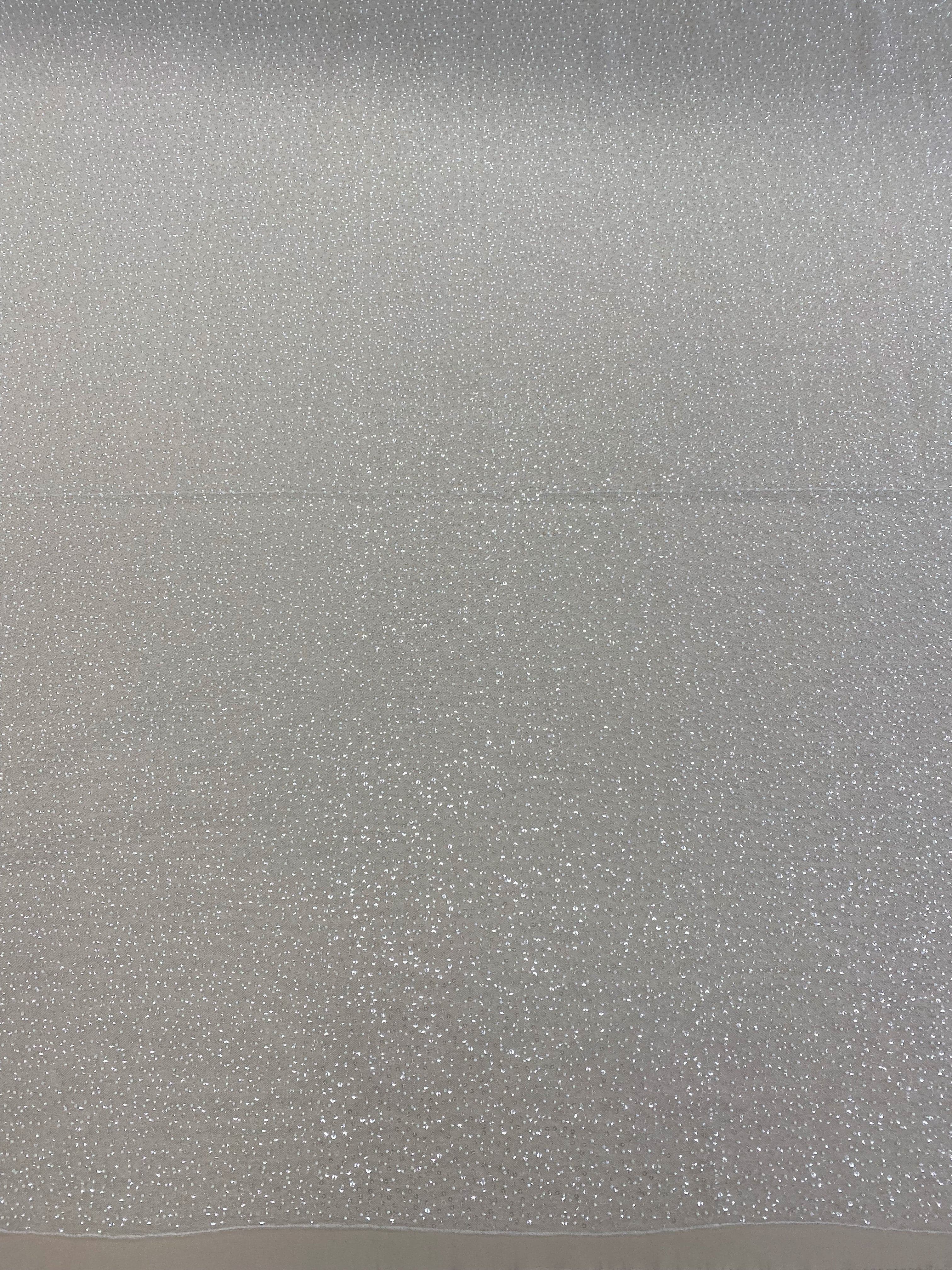 Ivory Sequin Tulle — featuring hand-beading and sequins, 100% nylon, 110cm wide