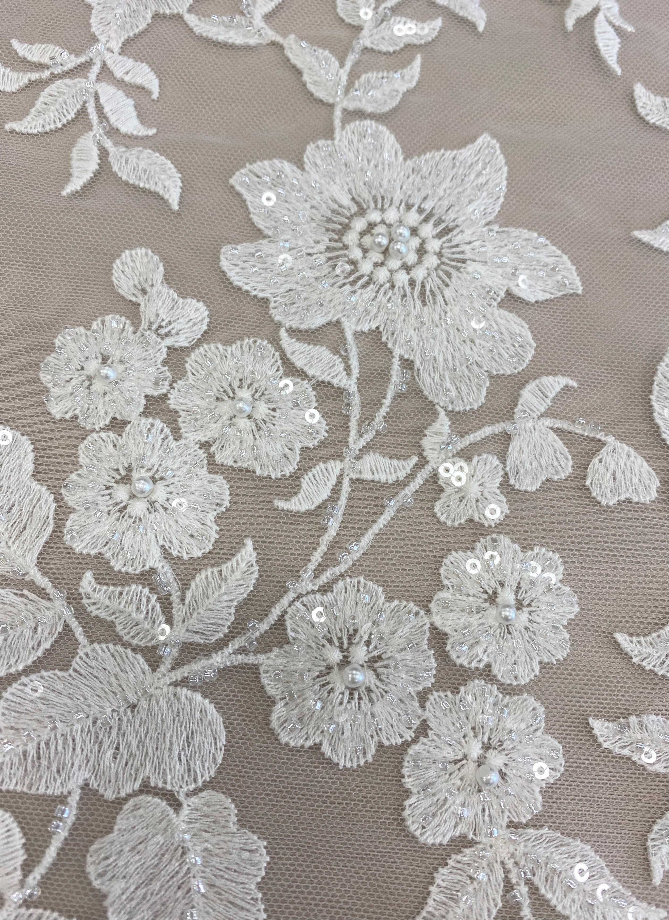Ivory Embellished Floral Tulle — featuring floral motifs and hand-beading, 60% rayon 40% nylon, 140cm wide