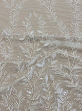 Ivory Embroidered Tulle — soft, 60% rayon 40% nylon, 140cm wide
