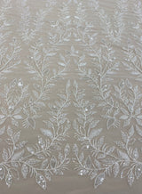 Ivory Embroidered Tulle — soft, 60% rayon 40% nylon, 140cm wide