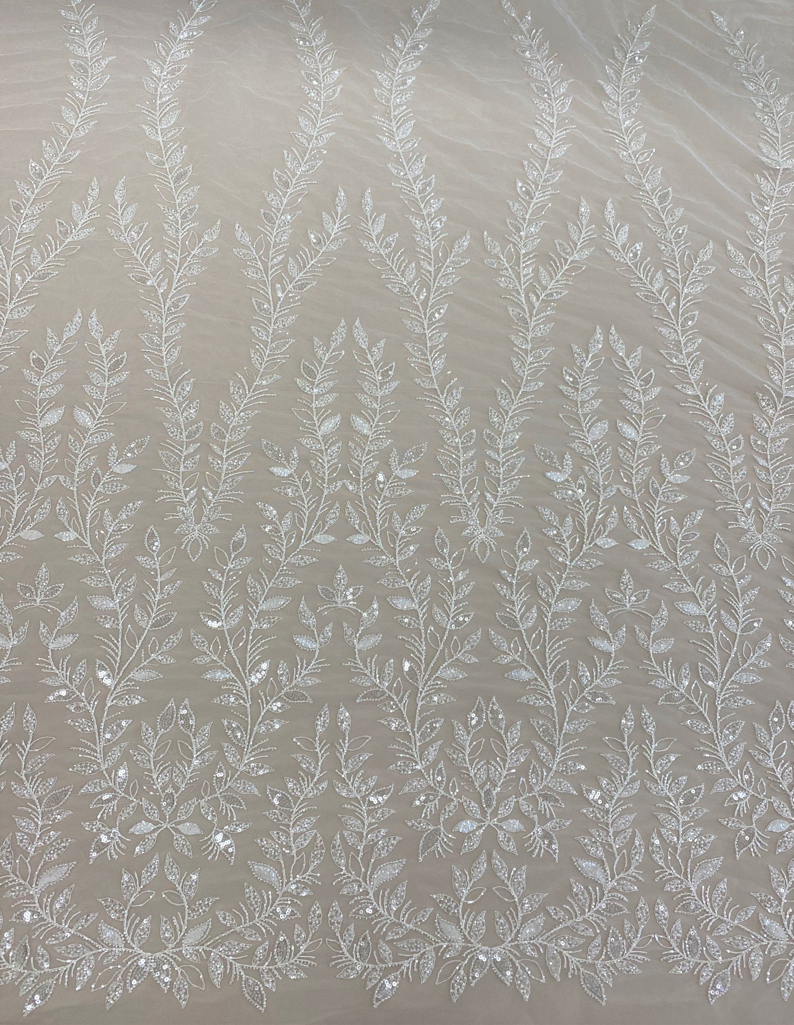 Ivory Embroidered Tulle — soft, 60% rayon 40% nylon, 140cm wide