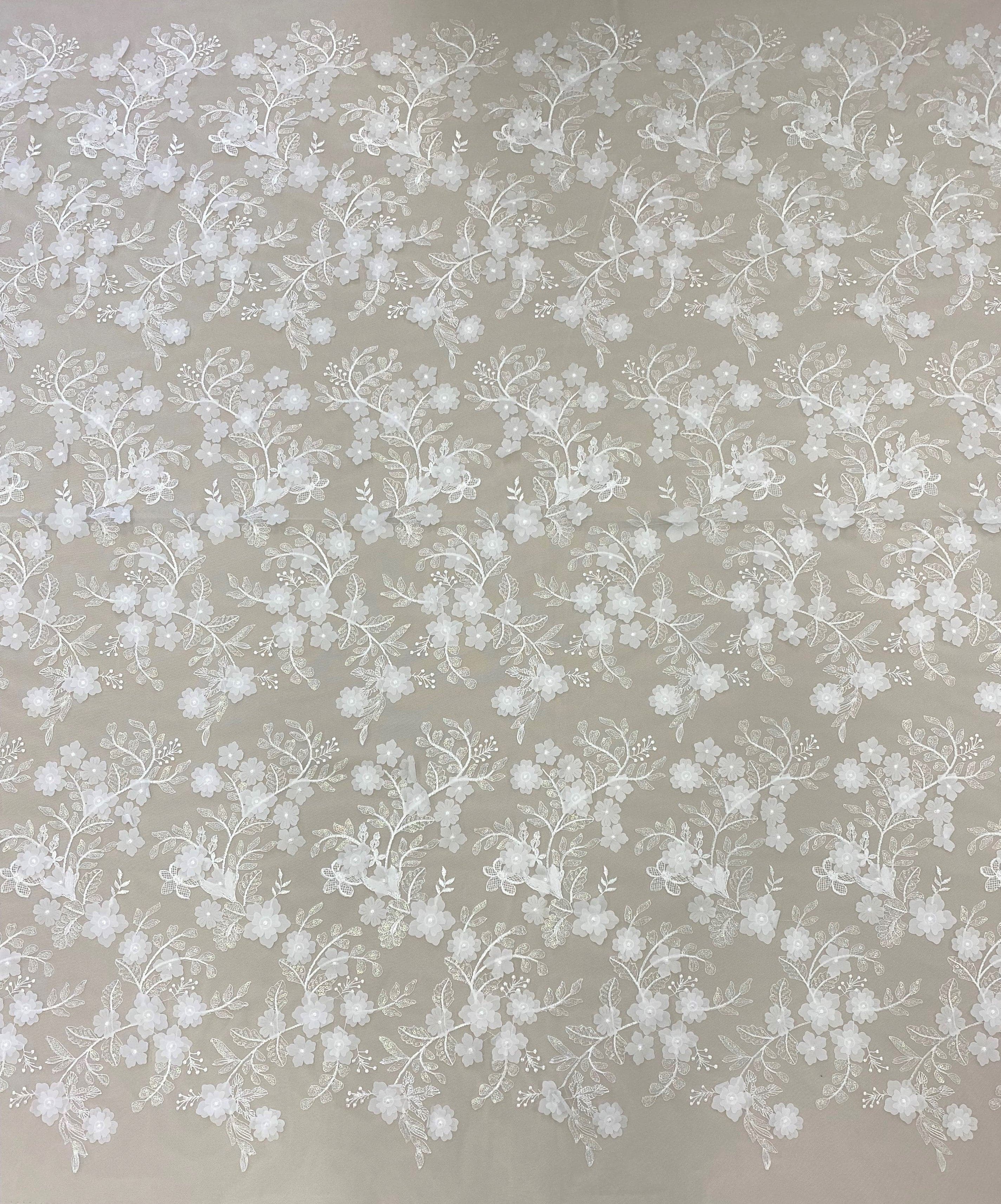 Ivory 3D Floral Tulle — featuring floral motifs, a 3D floral design and sequins, 60% rayon 40% nylon, 140cm wide