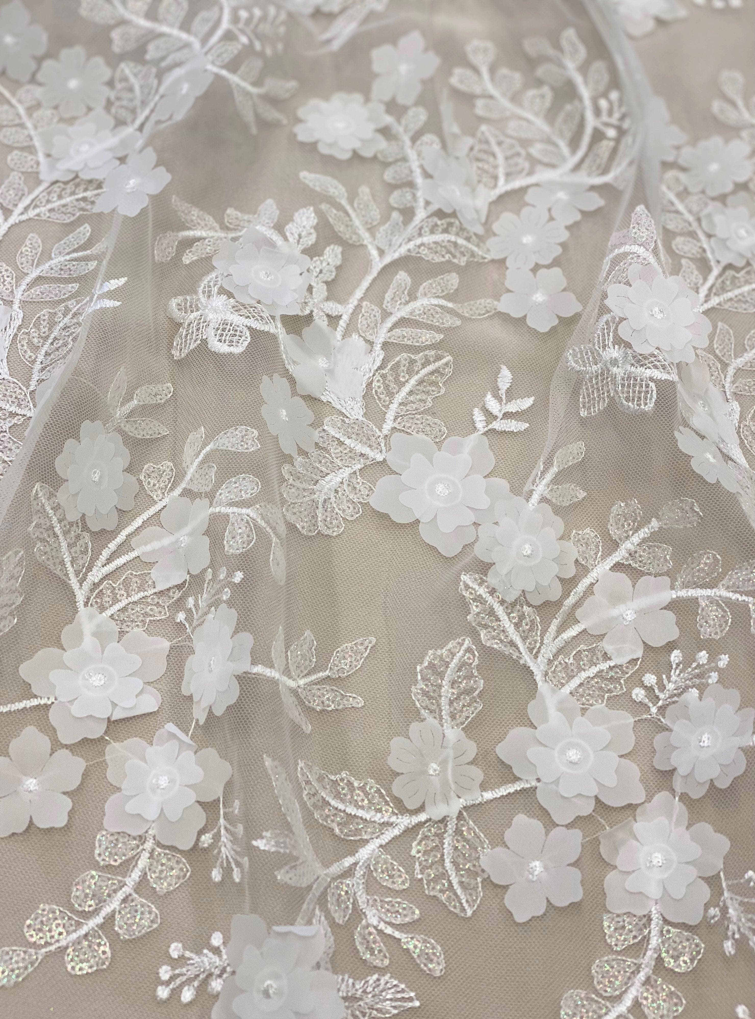 Ivory 3D Floral Tulle — featuring floral motifs, a 3D floral design and sequins, 60% rayon 40% nylon, 140cm wide