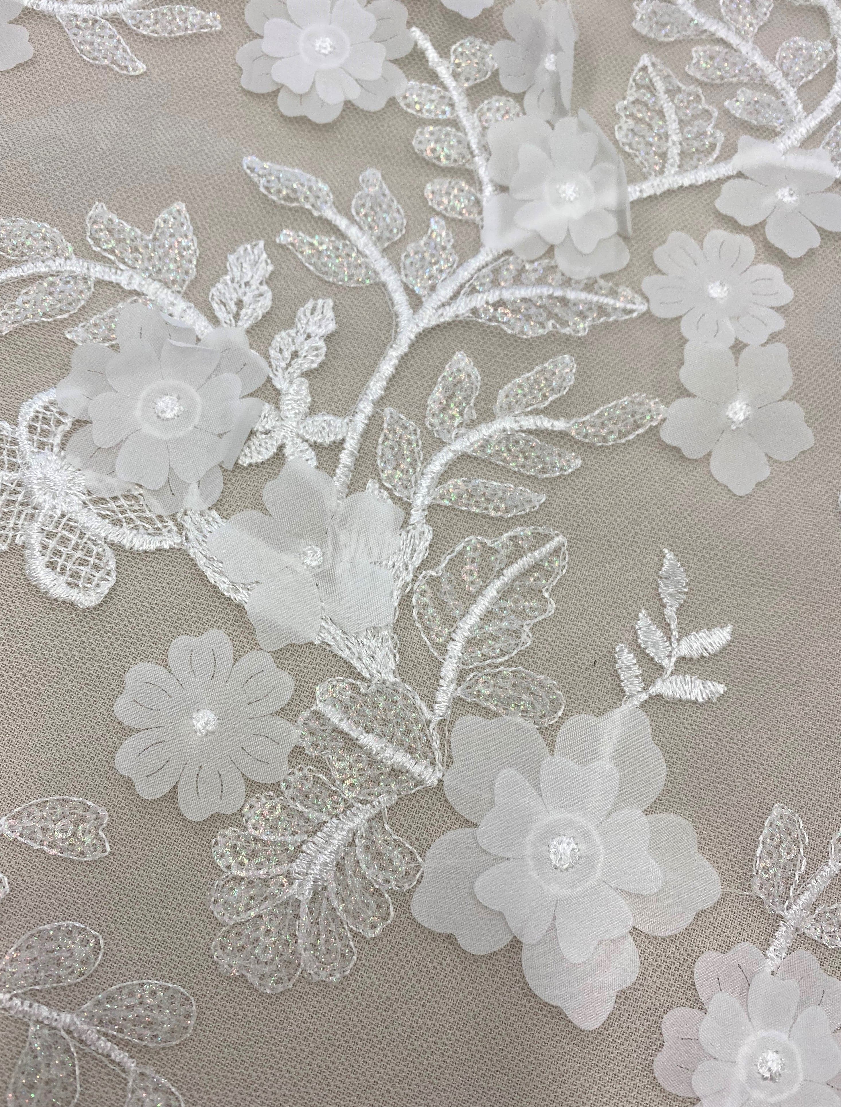 Ivory 3D Floral Tulle — featuring floral motifs, a 3D floral design and sequins, 60% rayon 40% nylon, 140cm wide