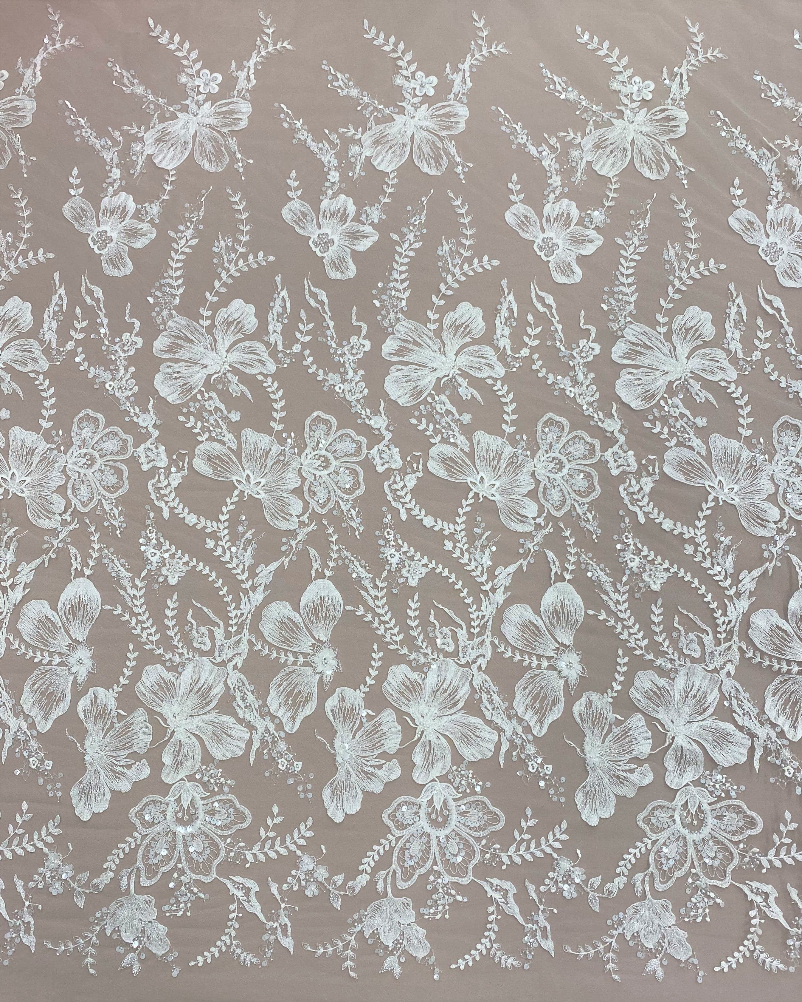 Ivory Embellished Tulle — featuring floral motifs and hand-beading, 60% rayon 40% nylon, 140cm wide