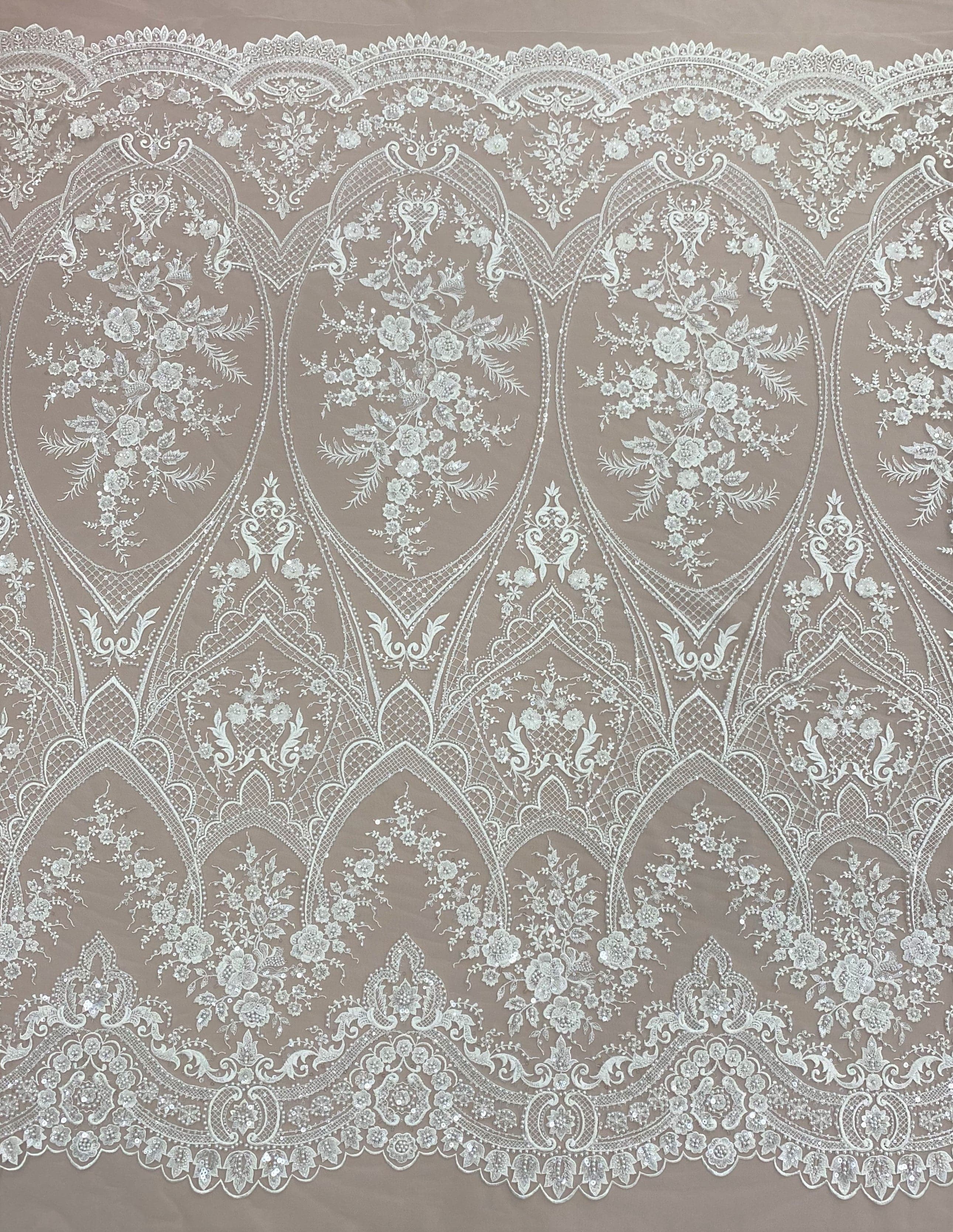 Ivory Embellished Tulle — featuring floral motifs, hand-beading and sequins, 60% rayon 40% nylon, 140cm wide