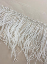 Ostrich feather trim — featuring a soft feather edge with delicate beading, mounted on tulle