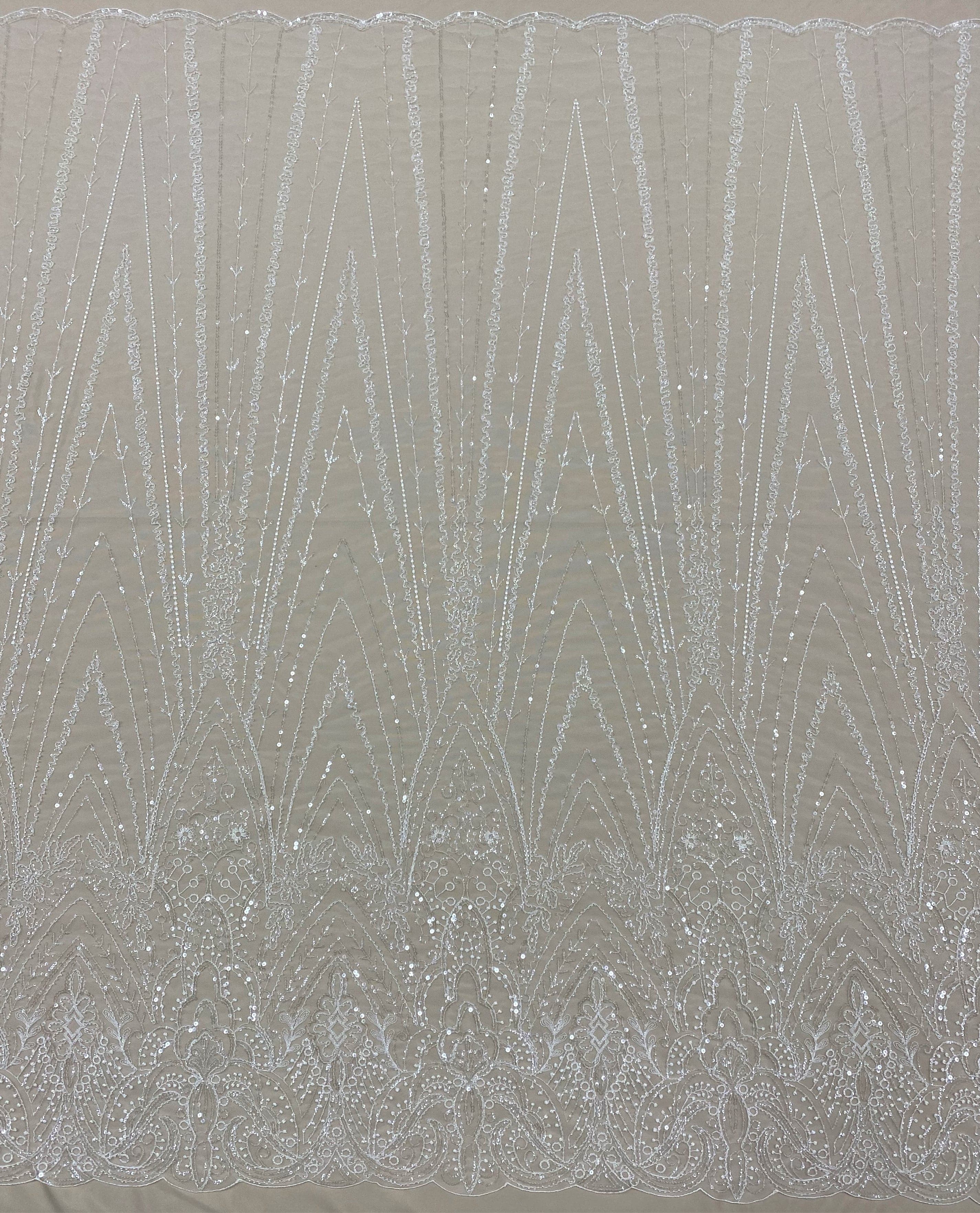 Ivory Embellished Tulle — featuring hand-beading and sequins, 50% nylon 50% rayon, 135cm wide