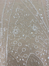 Ivory Embellished Tulle — featuring hand-beading and sequins, 50% nylon 50% rayon, 135cm wide