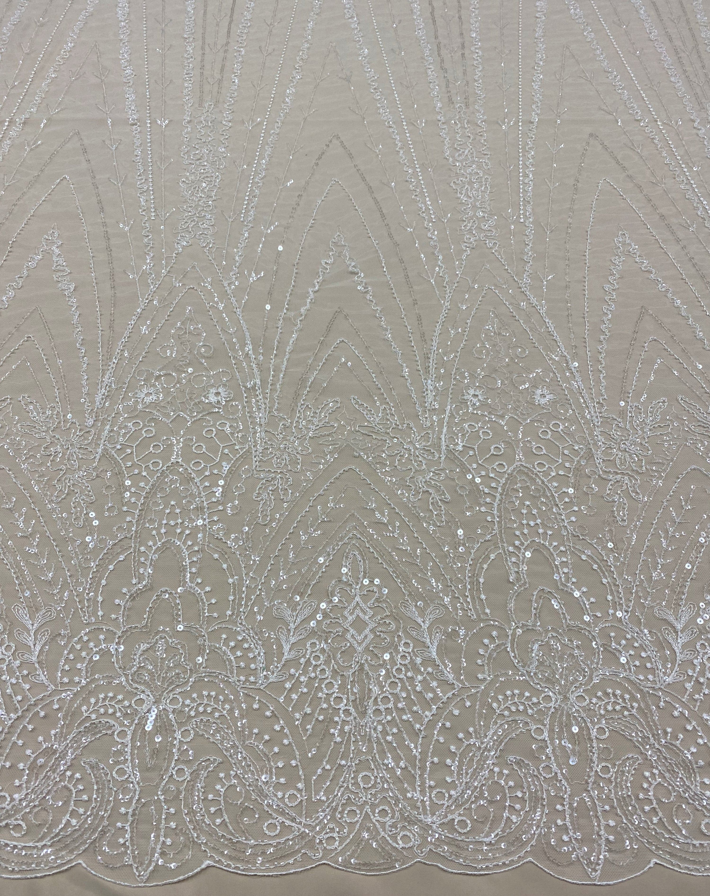 Ivory Embellished Tulle — featuring hand-beading and sequins, 50% nylon 50% rayon, 135cm wide