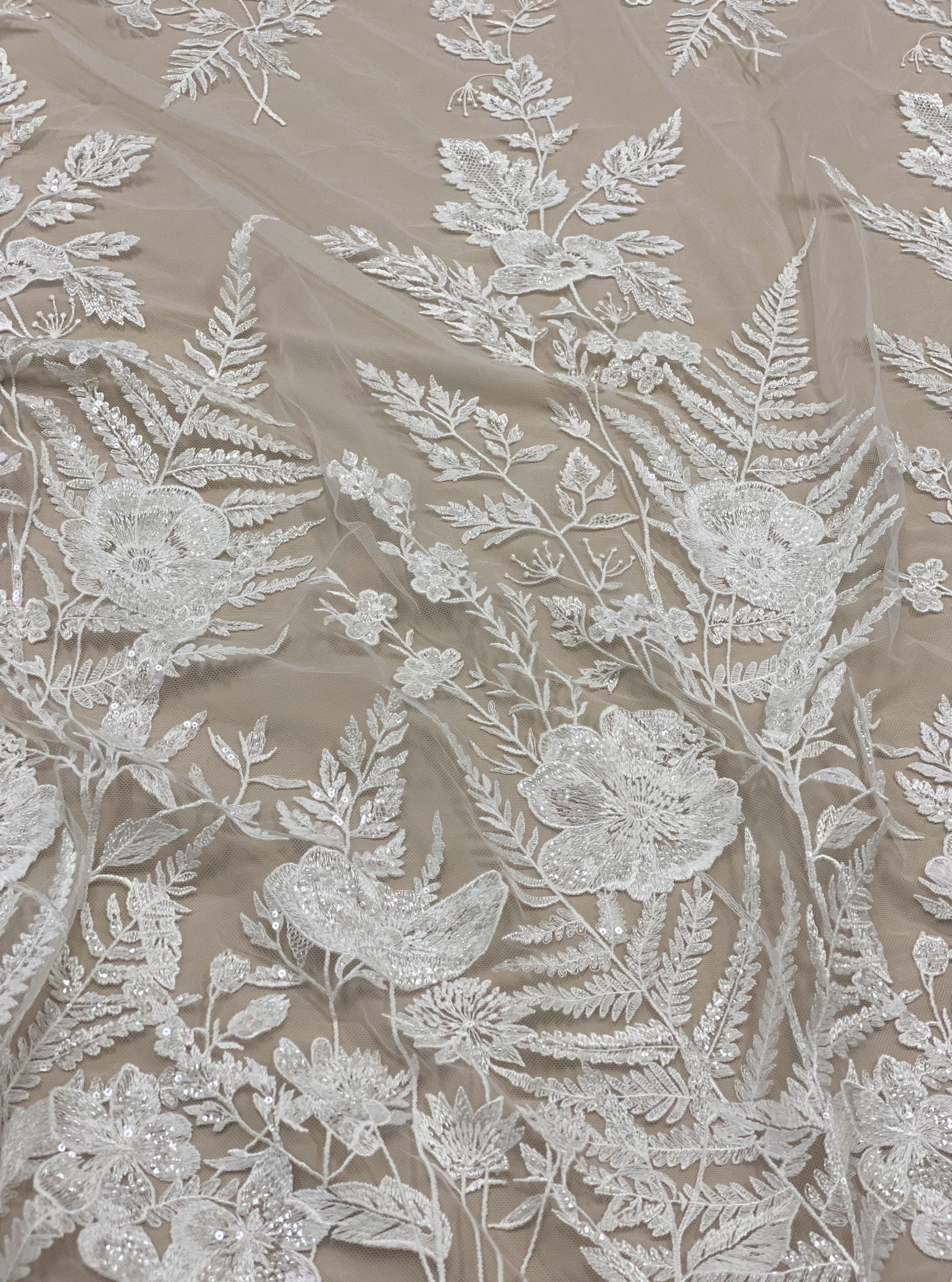 Ivory Embroidered Floral Tulle — featuring floral motifs, hand-beading and sequins, 50% nylon 30% polyester 20% rayon, 130cm wide