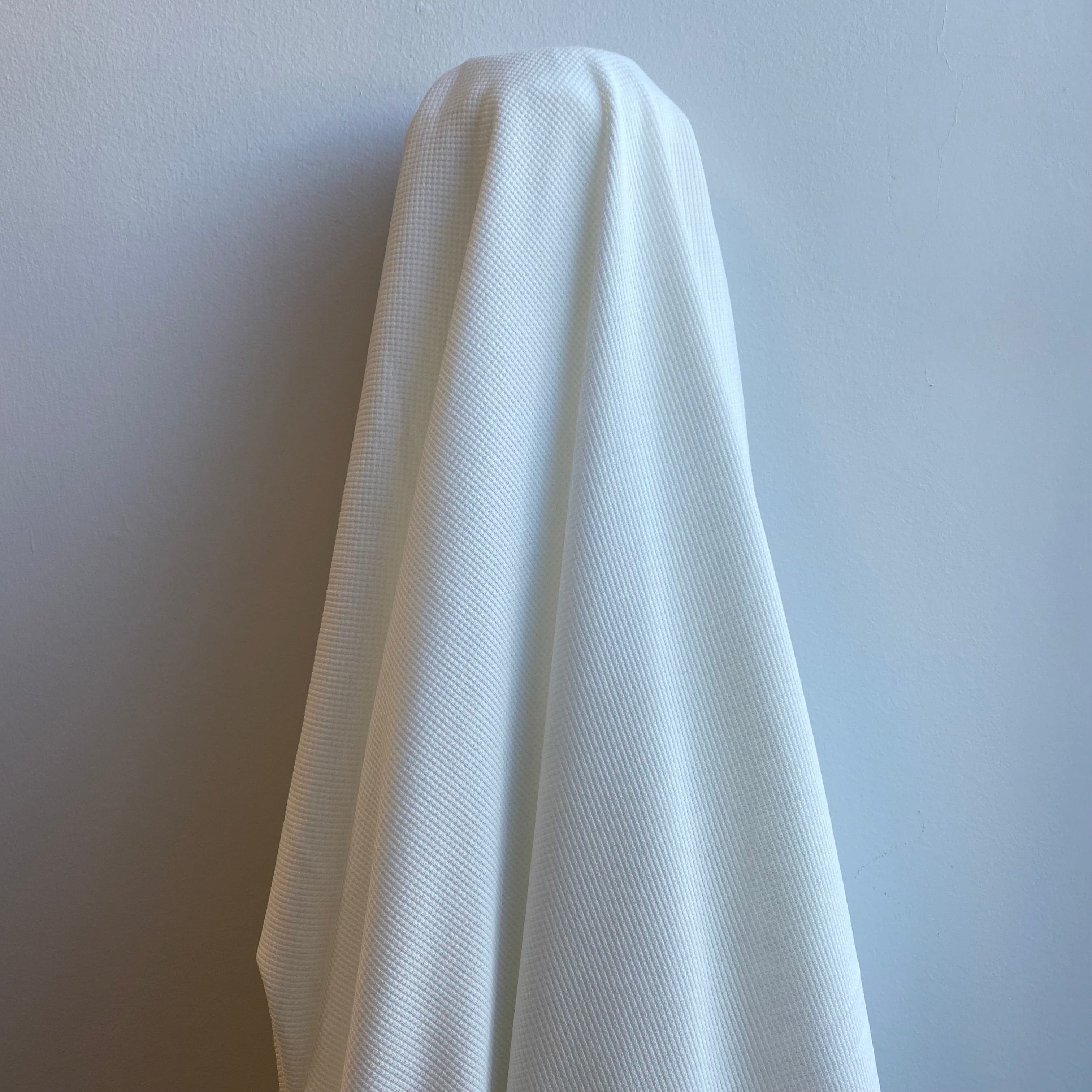 Ivory Recycled Waffle Knit — a soft waffle-textured knit in recycled polyester