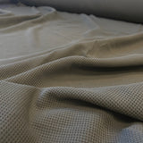 Khaki Recycled Waffle Knit — a soft waffle-textured knit in recycled polyester
