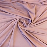 Tea Rose Recycled Waffle Knit — a soft waffle-textured knit in recycled polyester