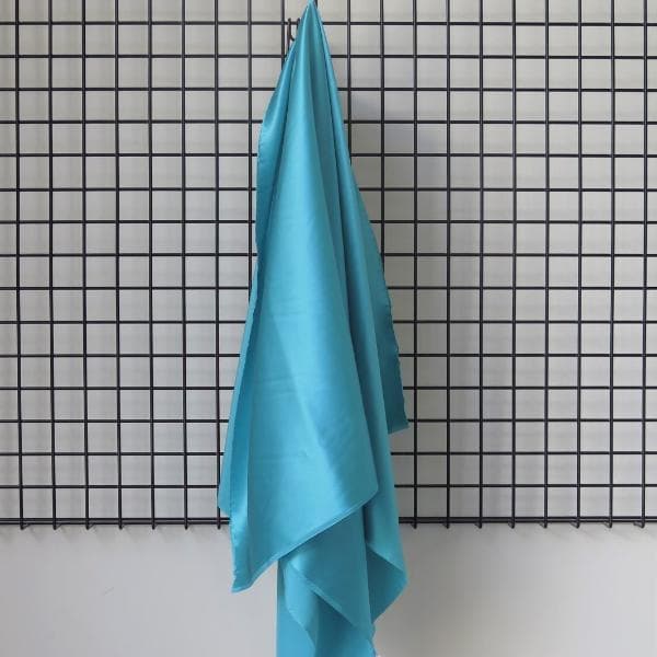 Aquamarine Sandwash Satin — lightweight and soft with a smooth luster satin finish, 100% mulberry silk, 140cm wide