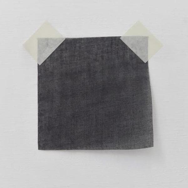 Black Cotton Organdy — a lightweight, semi-sheer cotton with a crisp, stiff handle, 100% cotton