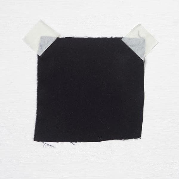 Black Sandwash Satin — lightweight and soft with a smooth luster satin finish, 100% mulberry silk, 140cm wide