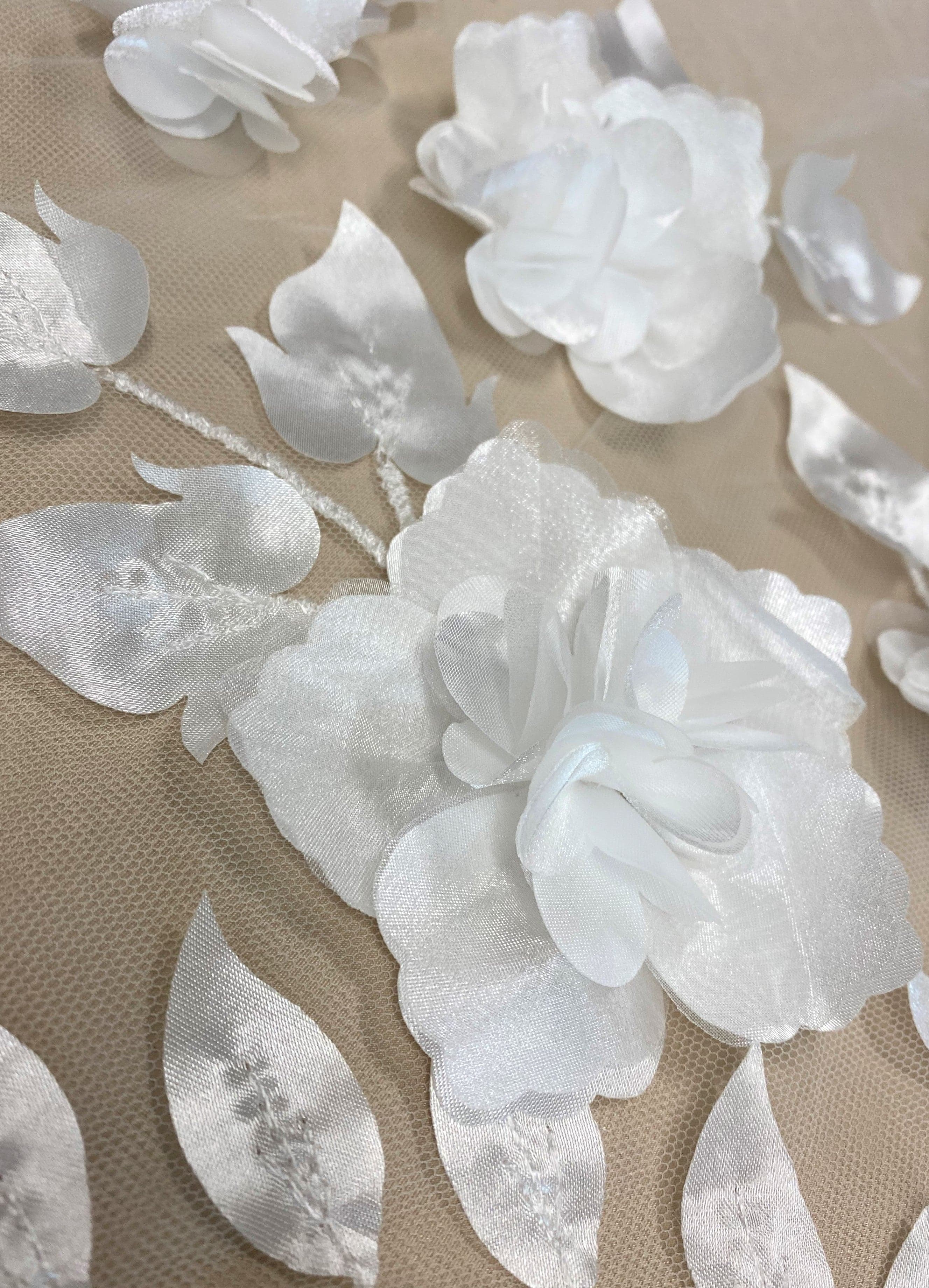 Ivory 3D Floral Tulle — featuring floral motifs, a 3D floral design and a border design, 40% polyester 30% nylon 30% rayon, 130cm wide
