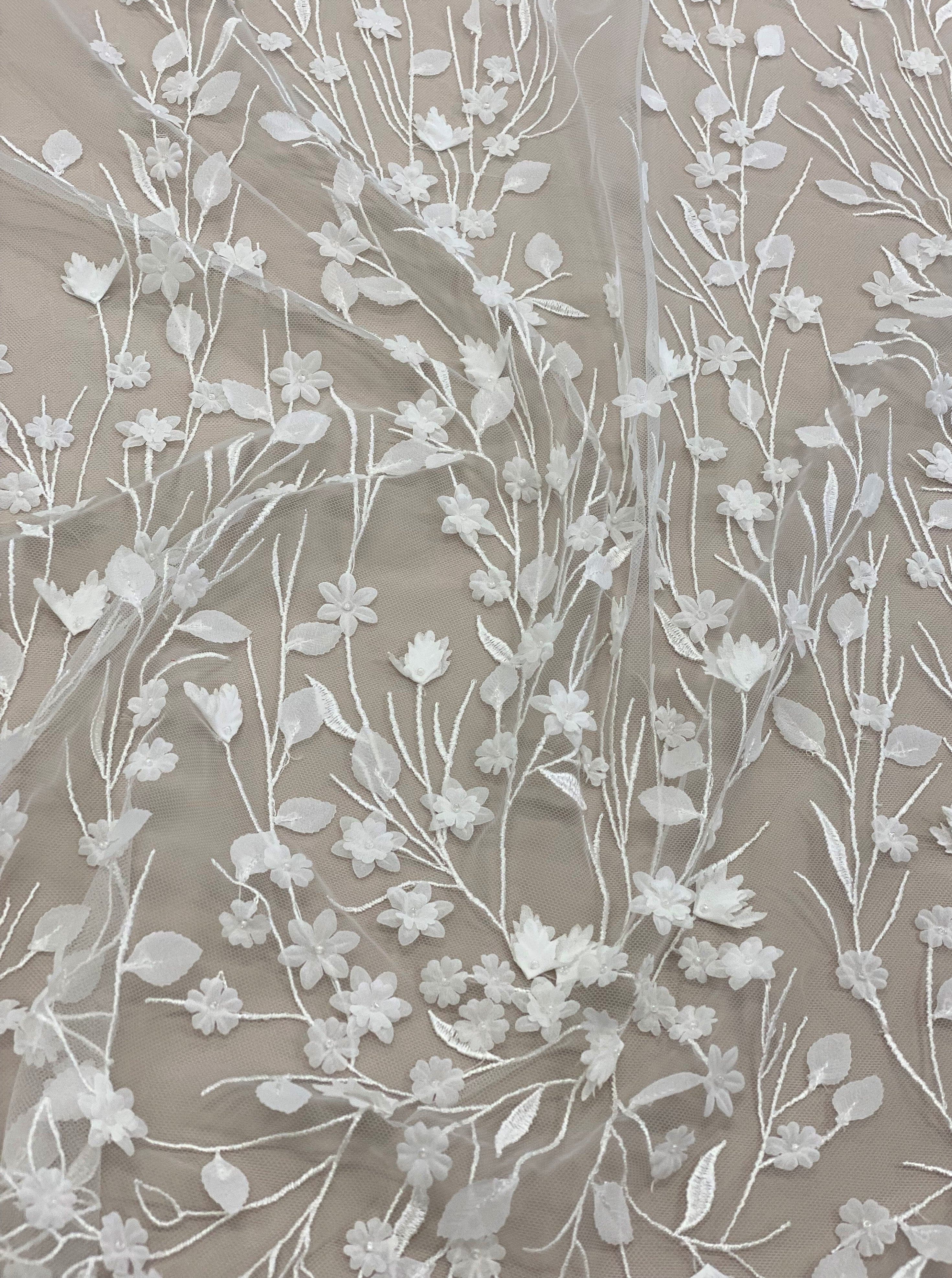 Ivory Embellished Tulle — featuring floral motifs and a botanical design, 30% nylon 40% polyester 30% rayon, 130cm wide