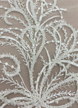 Ivory Embroidered Tulle — featuring a leaf design and hand-beading, 30% nylon 30% rayon 40% polyester, 130cm wide