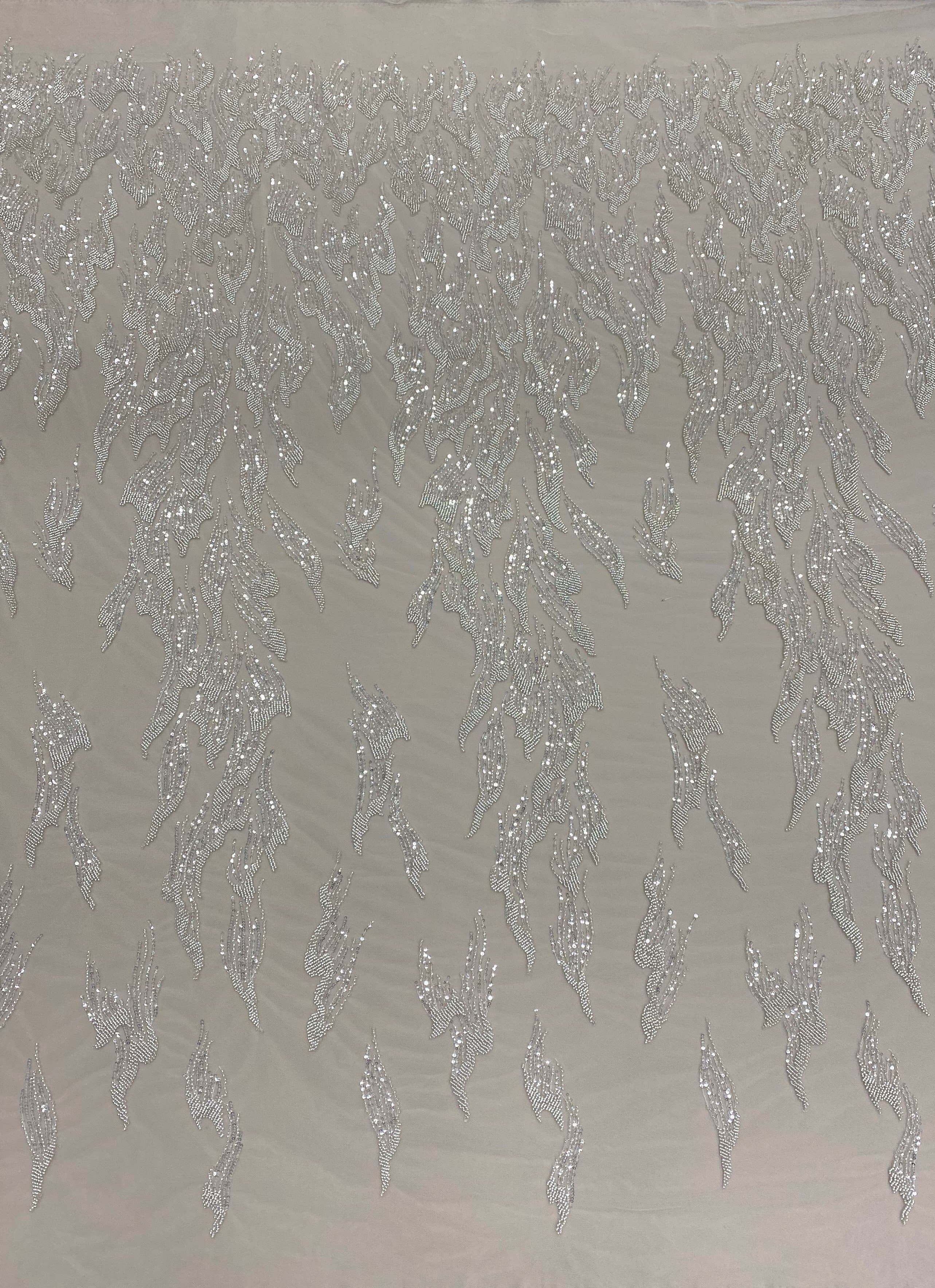 Ivory Beaded Tulle — featuring hand-beading, 30% nylon 40% rayon 30% polyester, 130cm wide
