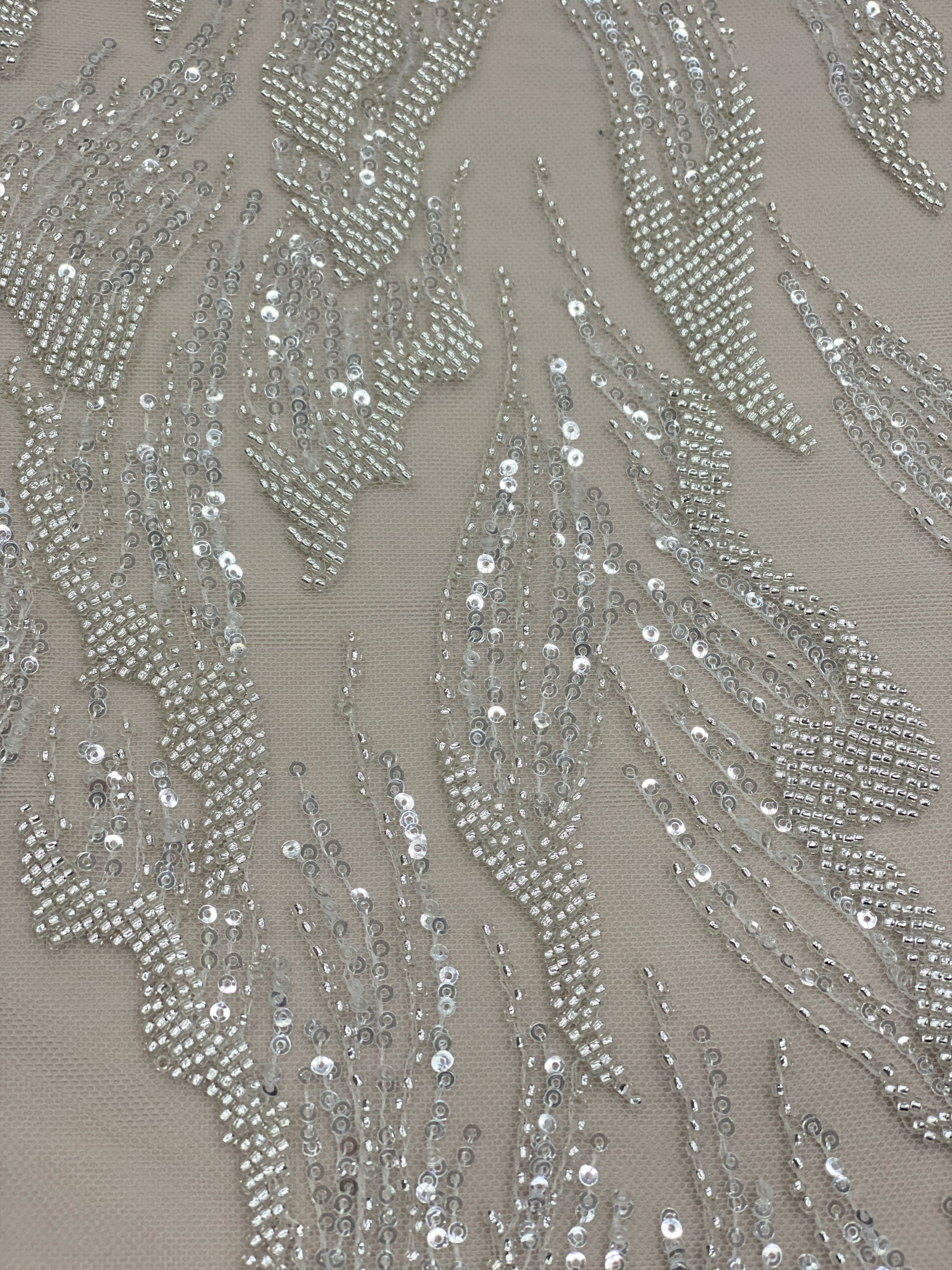 Ivory Beaded Tulle — featuring hand-beading, 30% nylon 40% rayon 30% polyester, 130cm wide
