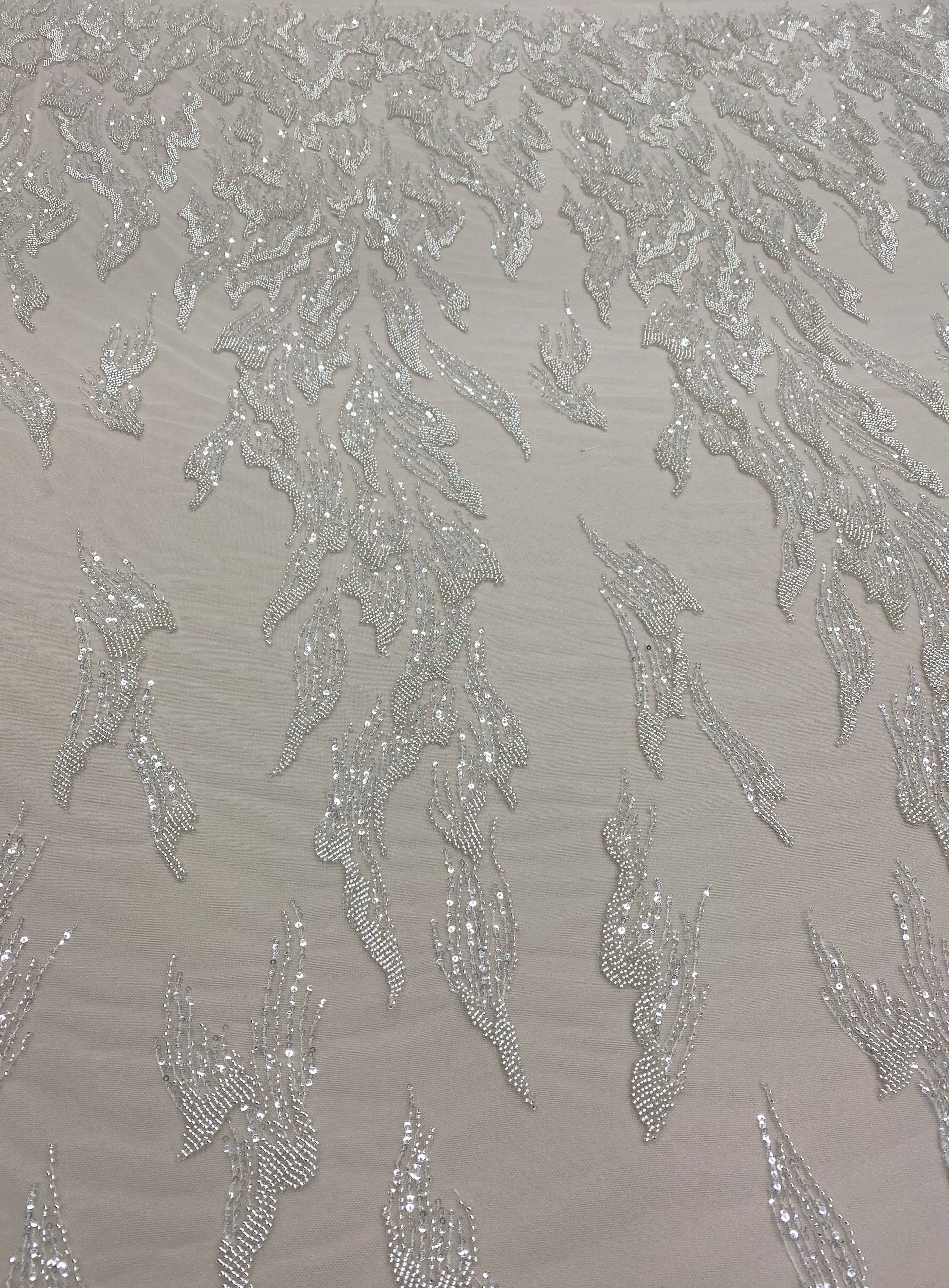 Ivory Beaded Tulle — featuring hand-beading, 30% nylon 40% rayon 30% polyester, 130cm wide