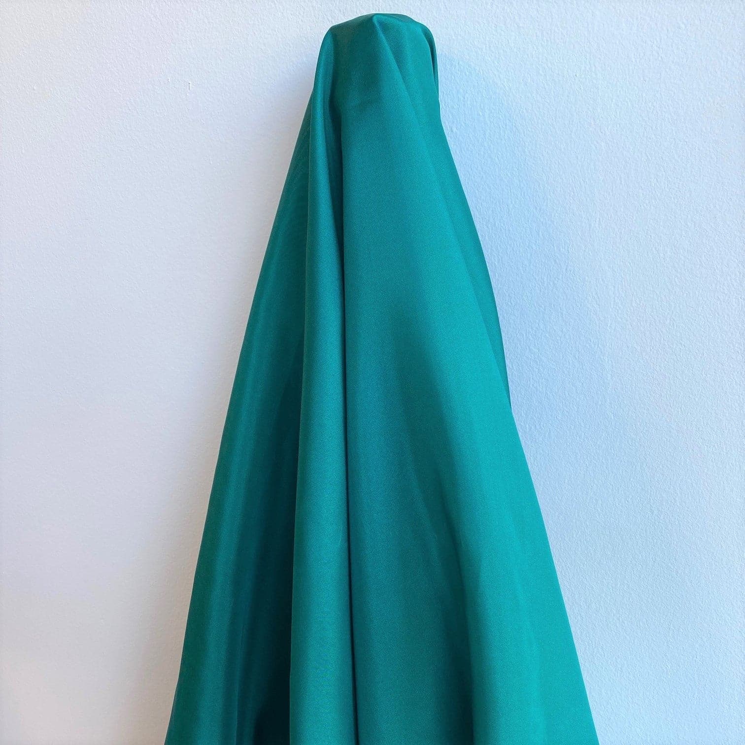 Emerald Habotai — soft with a light, airy drape and a smooth satin finish, 100% mulberry silk, 140cm wide