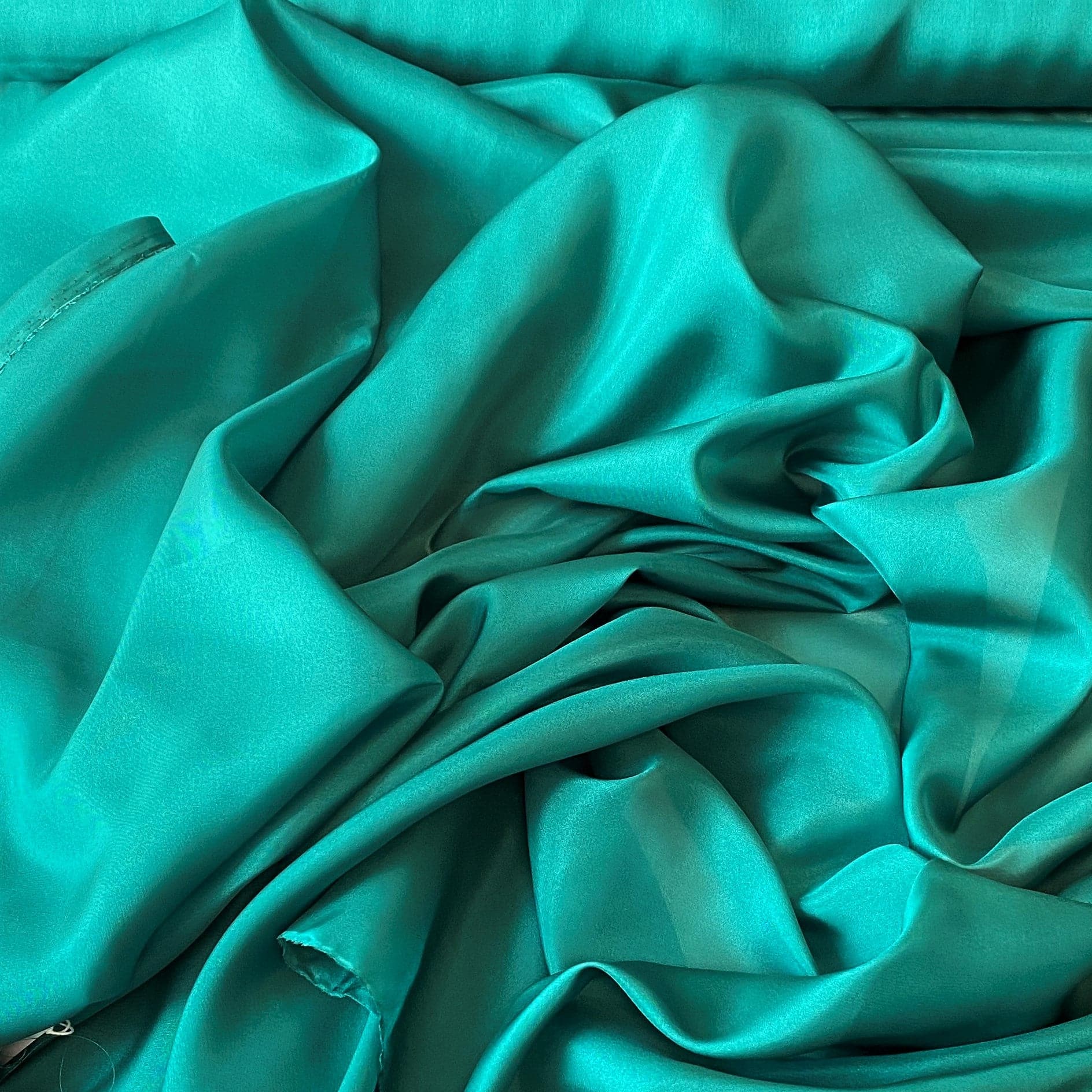 Emerald Habotai — soft with a light, airy drape and a smooth satin finish, 100% mulberry silk, 140cm wide