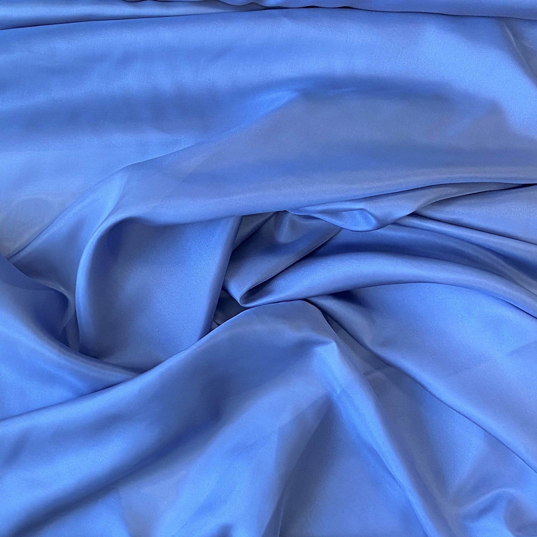 Wedgewood Habotai — soft with a light, airy drape and a smooth satin finish, 100% mulberry silk, 140cm wide