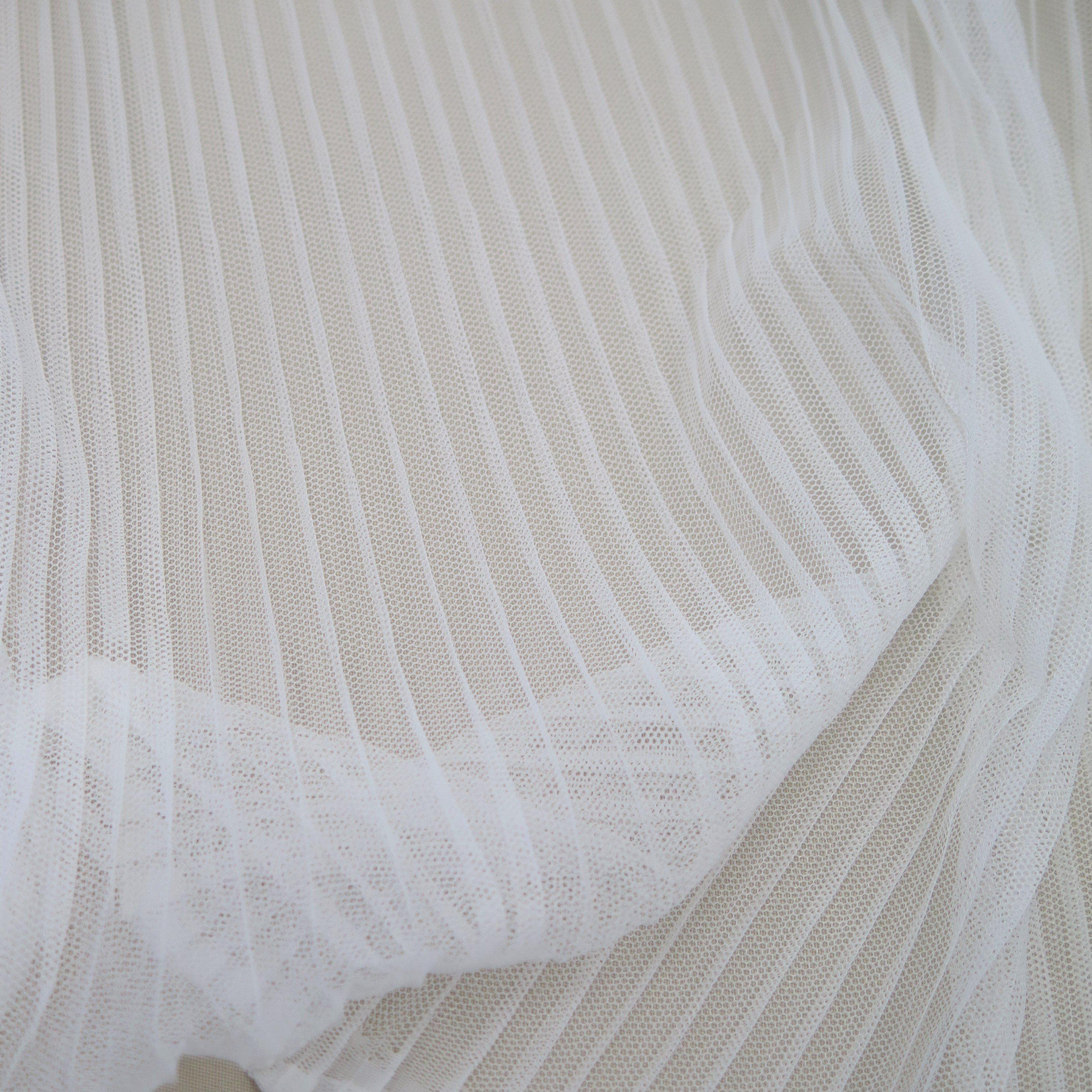 Ivory Pleated Tulle — lightweight and soft, 100% polyester, 145cm wide