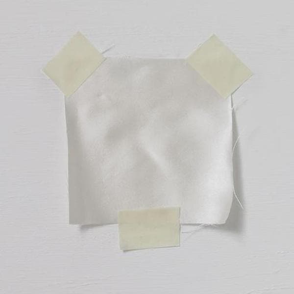 Ivory Queen Satin — a heavyweight silk with a delustred satin finish and structured handle, 100% silk
