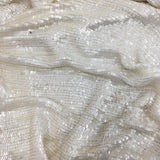 Ivory Sequin Georgette — featuring rows of sequins running the length, with a soft mid-weight drape
