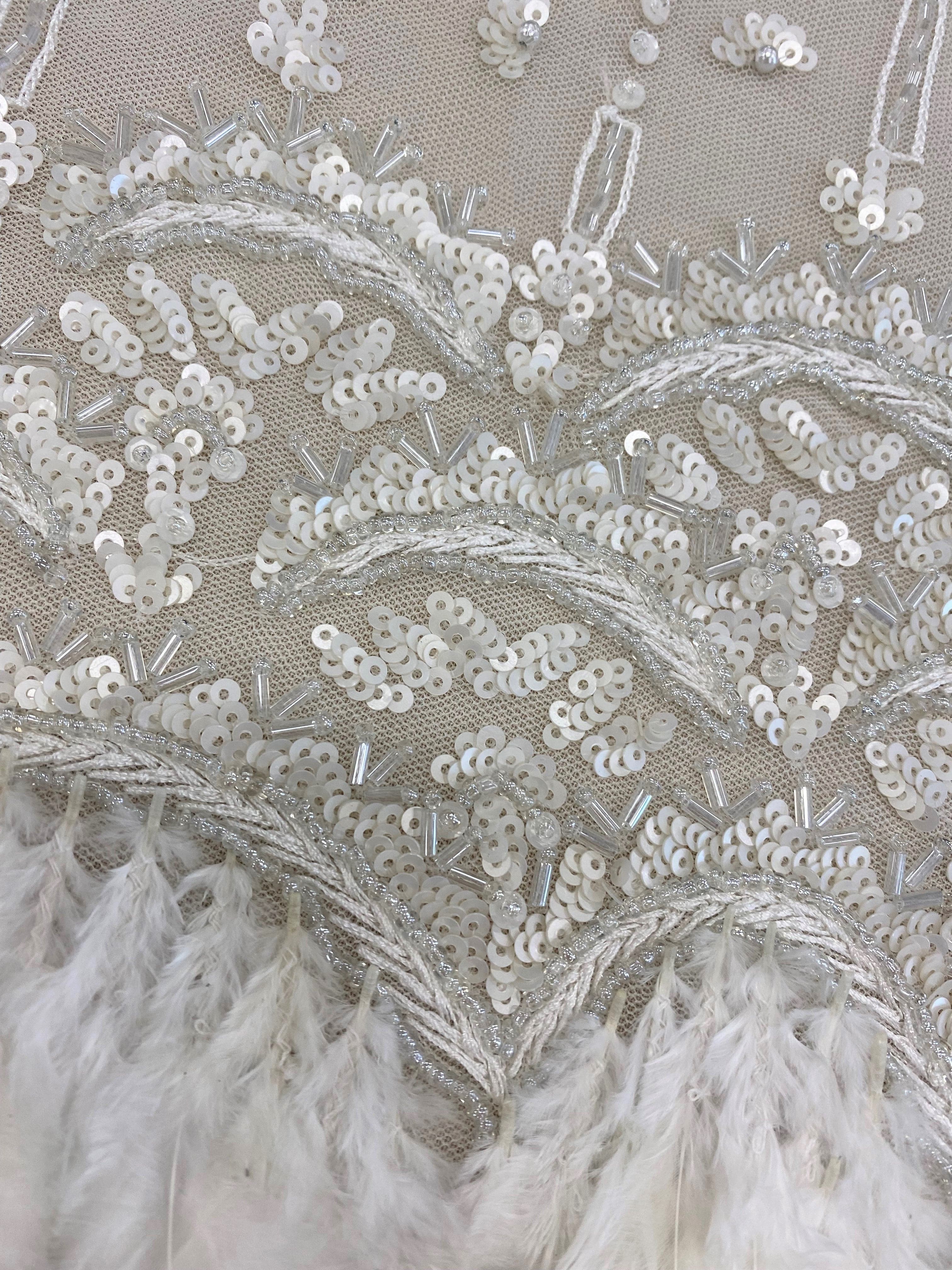 Ivory Feather Tulle — featuring hand-beading and sequins, 100% polyester, 110cm wide
