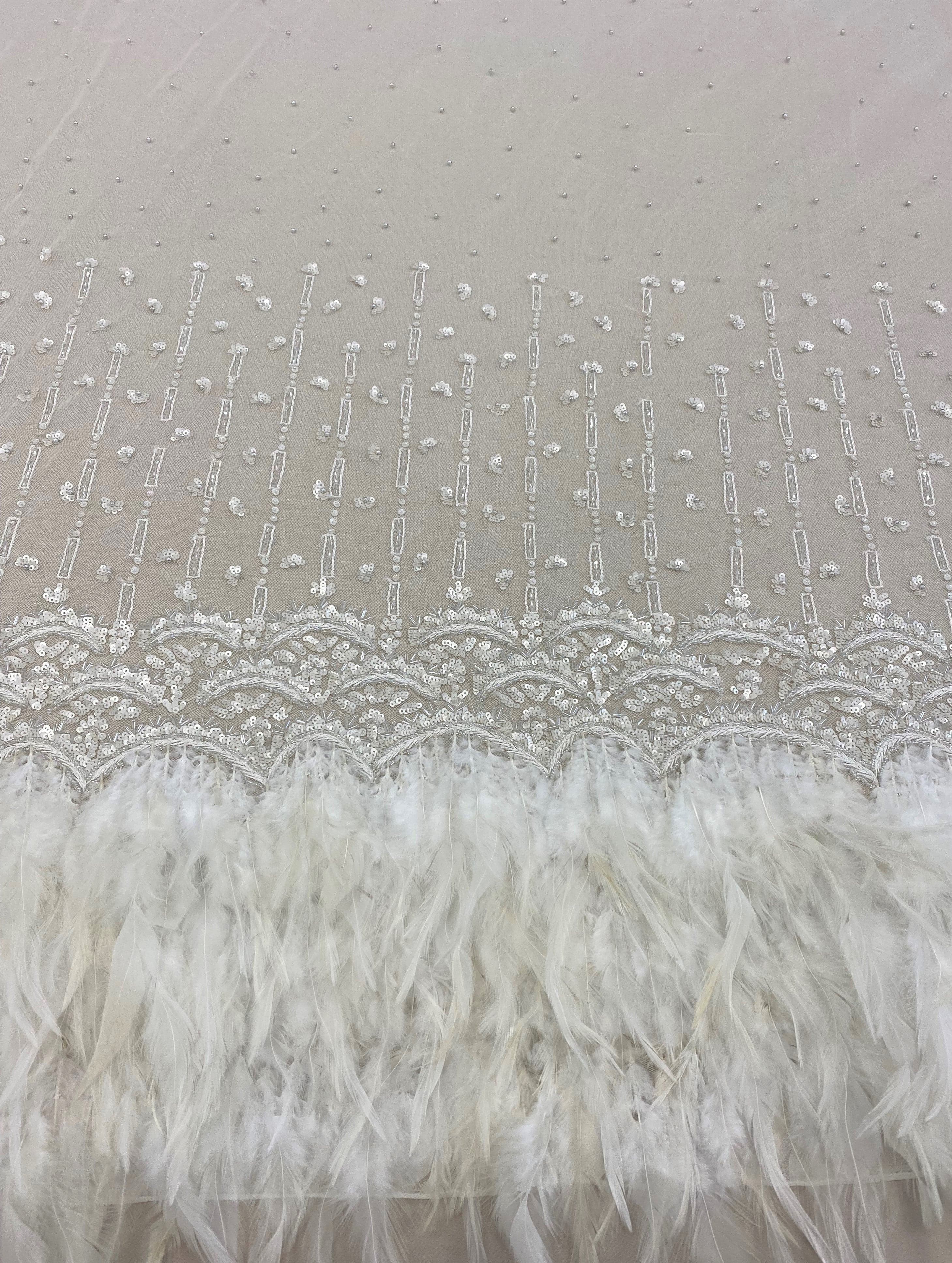 Ivory Feather Tulle — featuring hand-beading and sequins, 100% polyester, 110cm wide