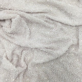 White Sequin Georgette — heavily sequined on a 100% silk georgette base, with sequins running the length, 110cm wide