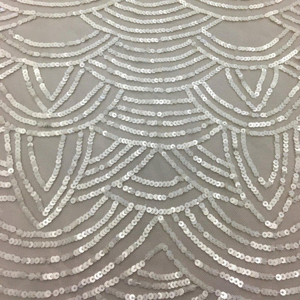 Ivory Scallop Sequin Tulle — featuring scalloped edges and sequins, 100% nylon, 110cm wide