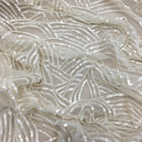 Ivory Scallop Sequin Tulle — featuring scalloped edges and sequins, 100% nylon, 110cm wide
