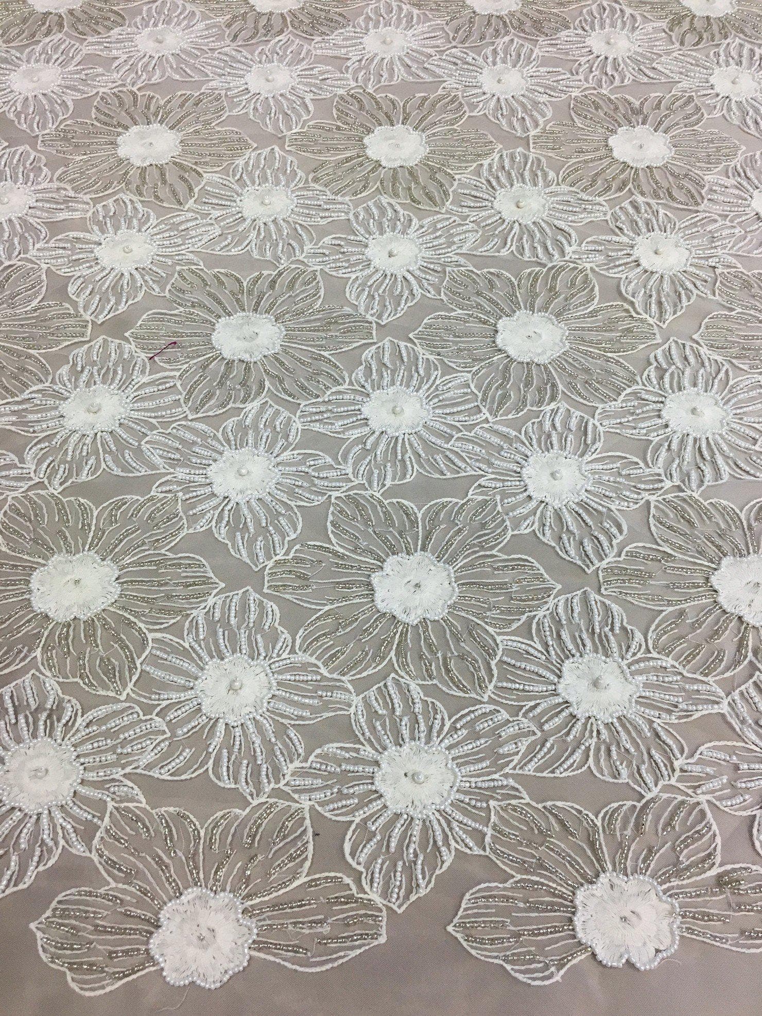 Ivory Floral Beaded Tulle — featuring floral motifs and hand-beading, 100% nylon, 105cm wide