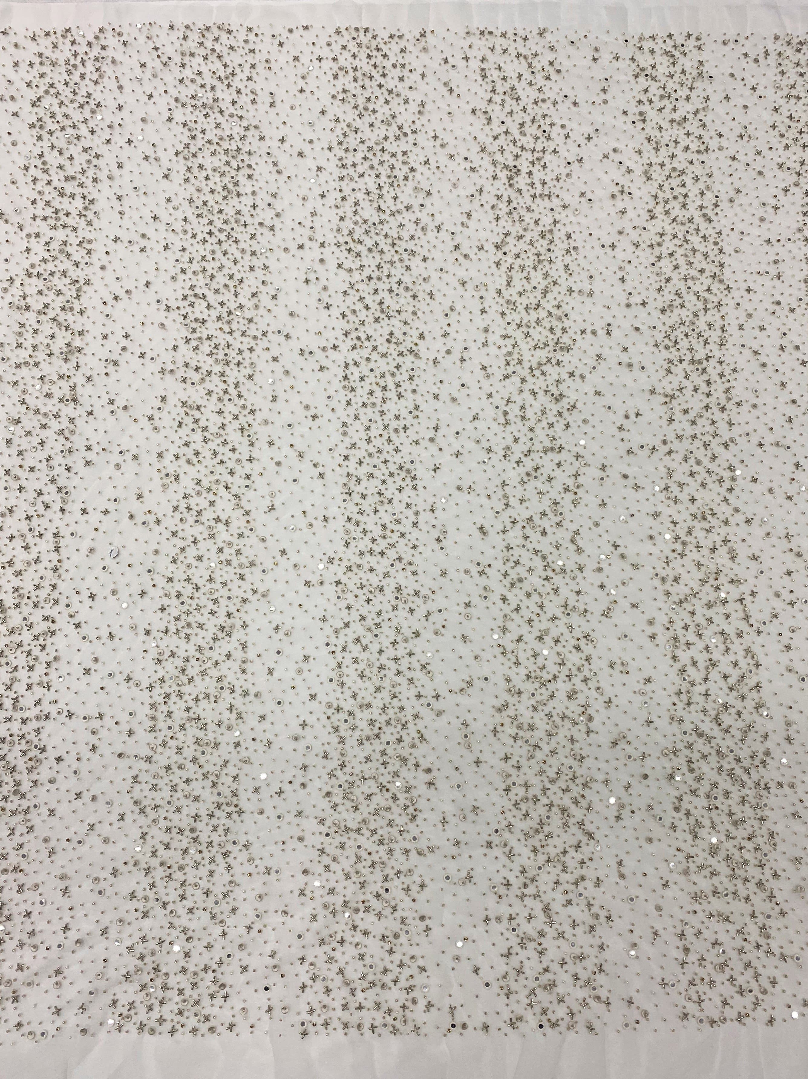 Ivory Beaded Tulle — featuring hand-beading and sequins, 100% nylon, 140cm wide