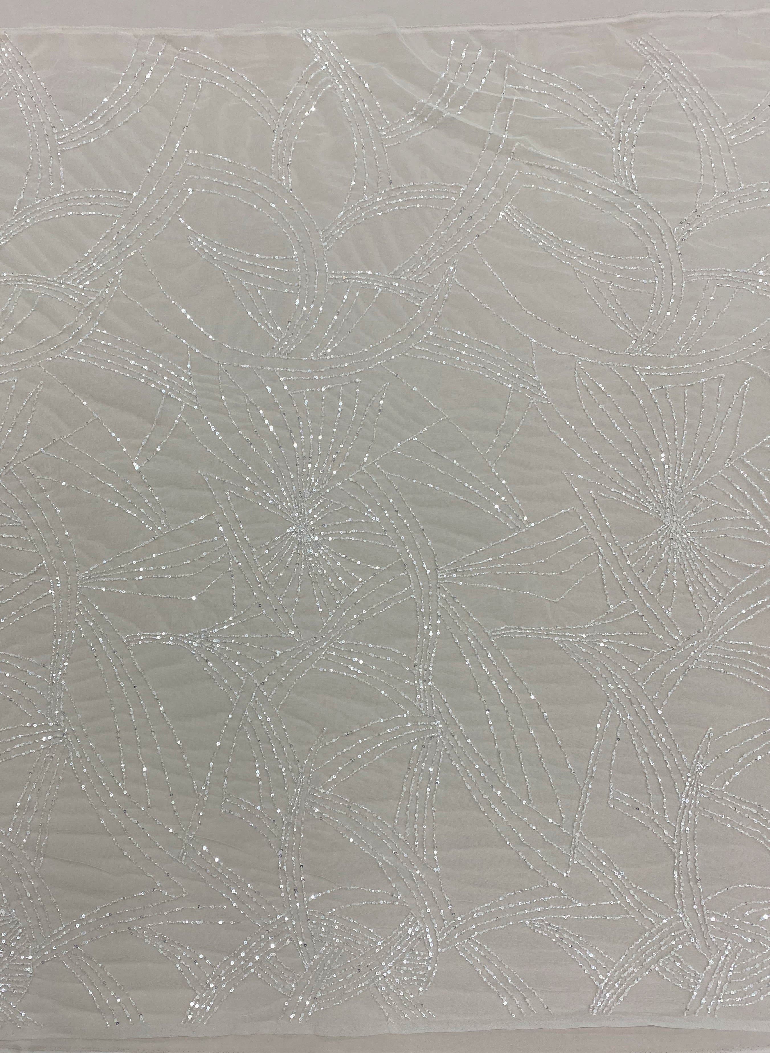Ivory Beaded Tulle — featuring hand-beading and sequins, 100% nylon, 140cm wide