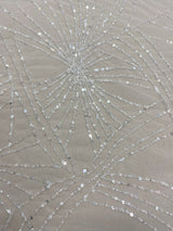Ivory Beaded Tulle — featuring hand-beading and sequins, 100% nylon, 140cm wide