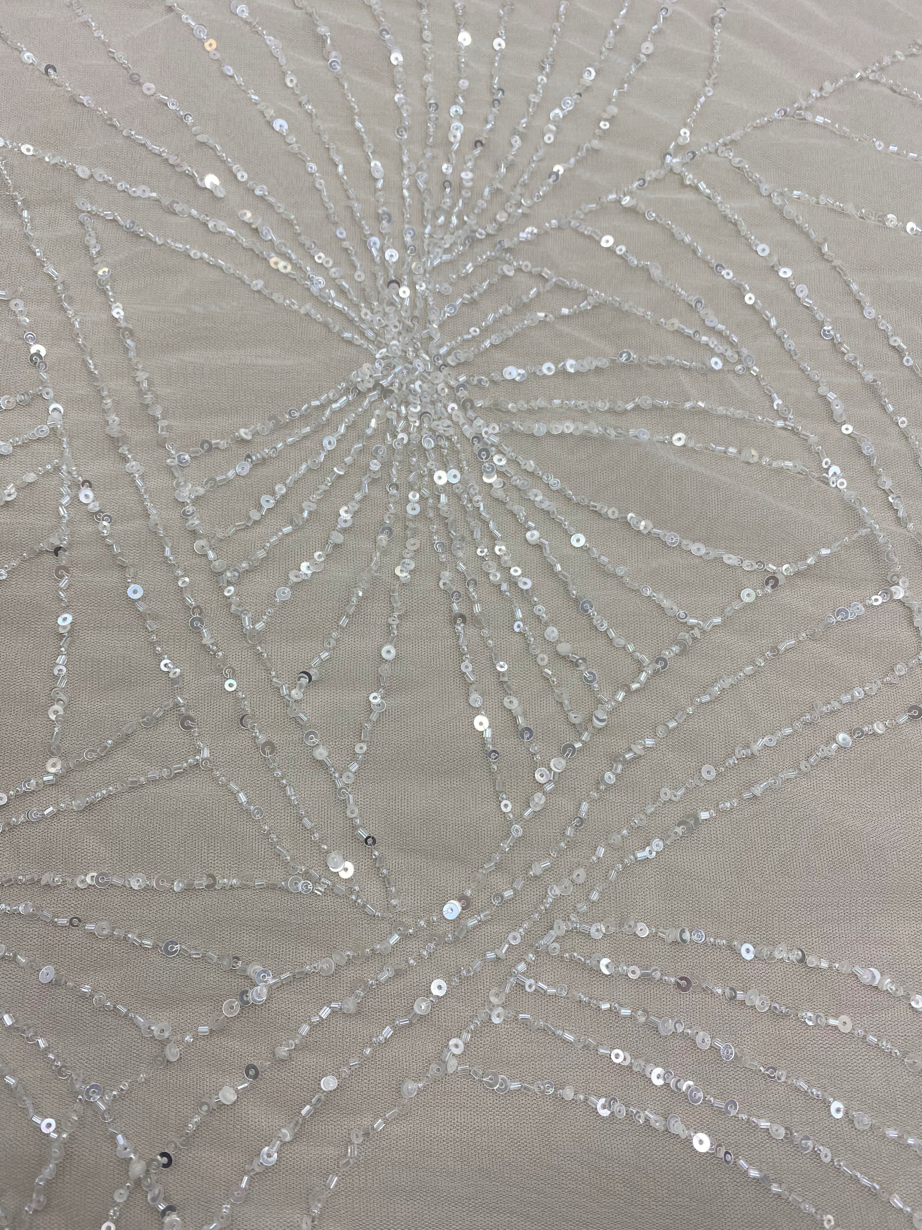 Ivory Beaded Tulle — featuring hand-beading and sequins, 100% nylon, 140cm wide
