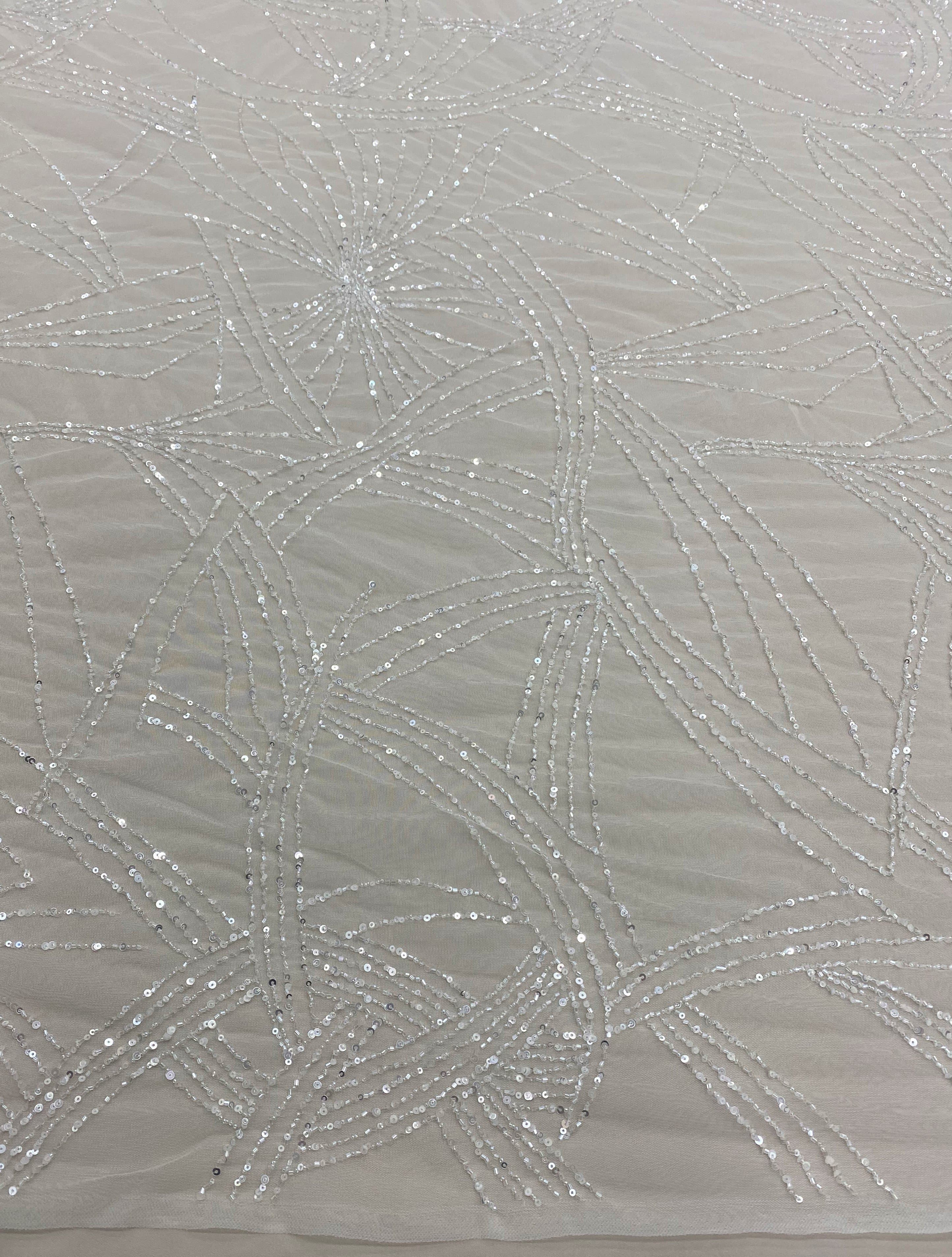 Ivory Beaded Tulle — featuring hand-beading and sequins, 100% nylon, 140cm wide
