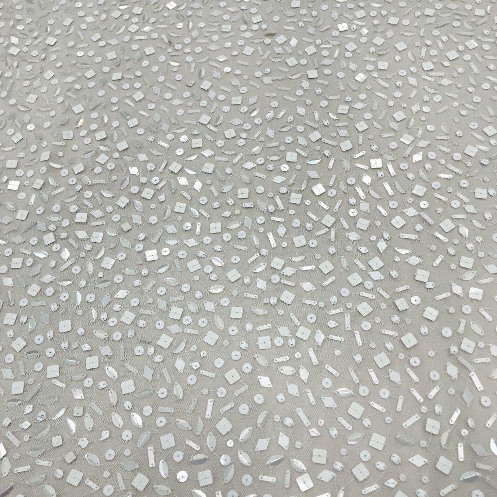 Ivory Sequin Tulle — featuring sequins, 100% nylon, 110cm wide