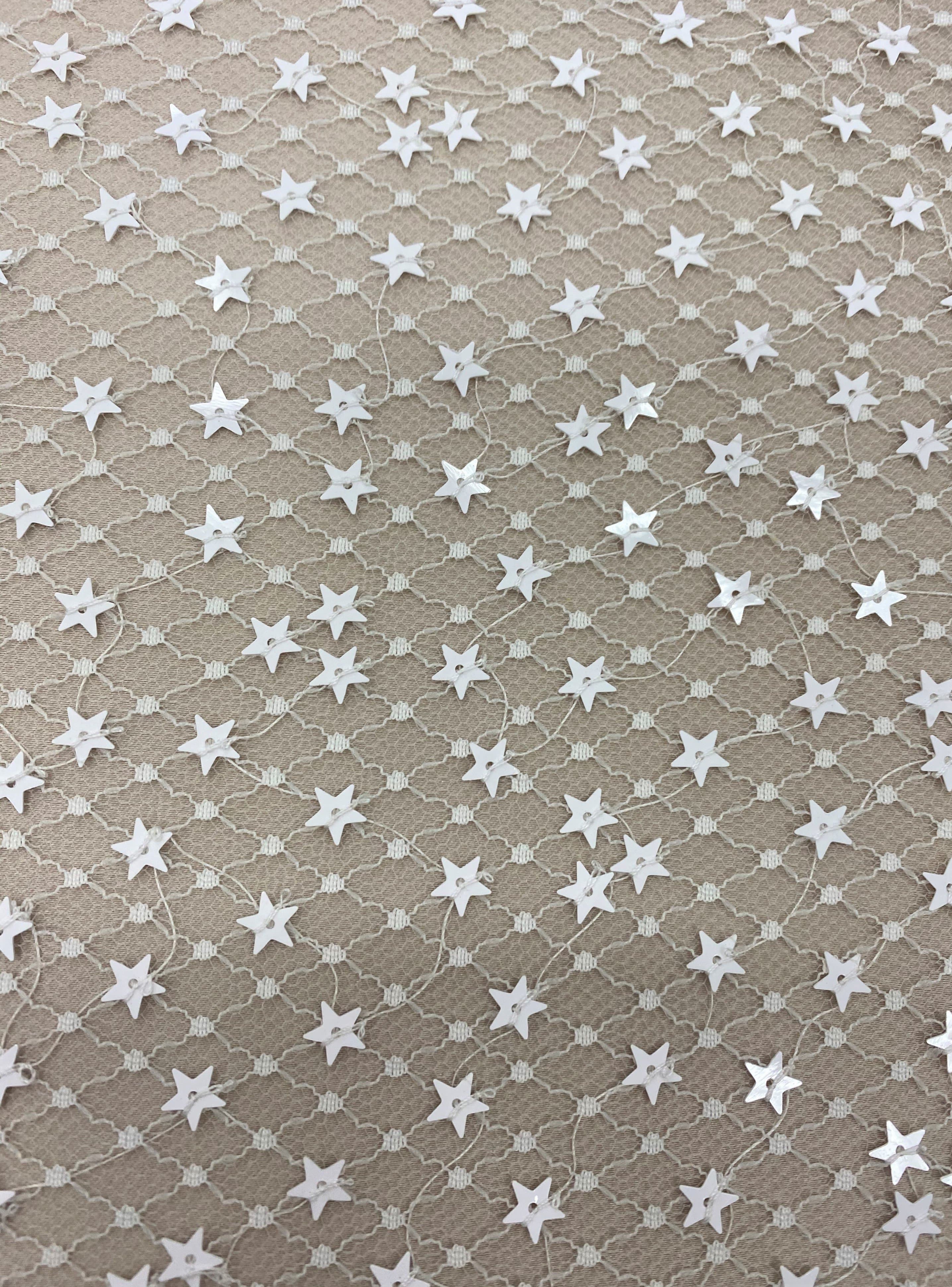 Ivory Sequin Star Tulle — featuring sequins, 100% polyamide, 130cm wide