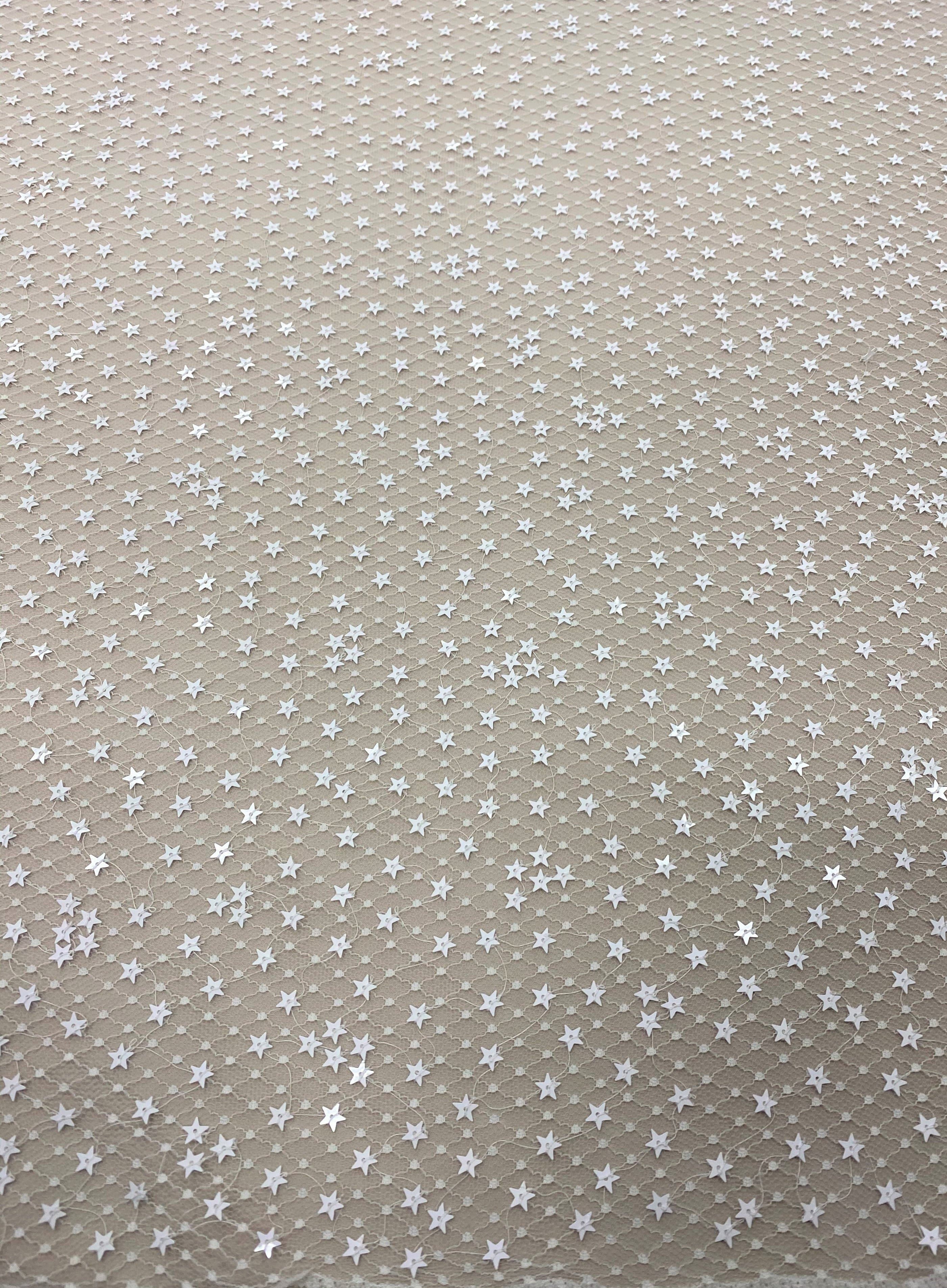 Ivory Sequin Star Tulle — featuring sequins, 100% polyamide, 130cm wide