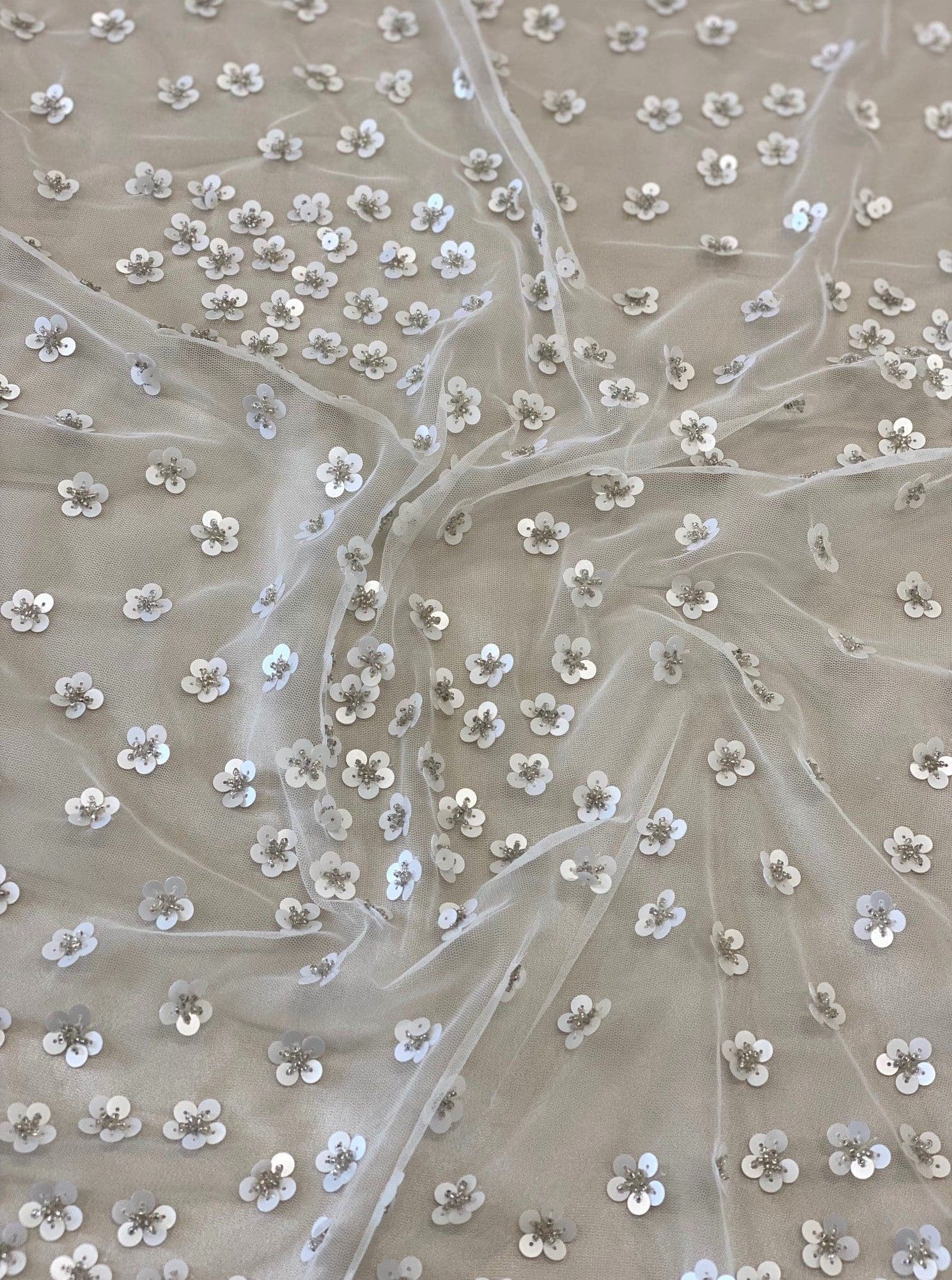 Ivory / Pink Floral Sequin Tulle — featuring hand-beading and sequins, 100% nylon, 110cm wide