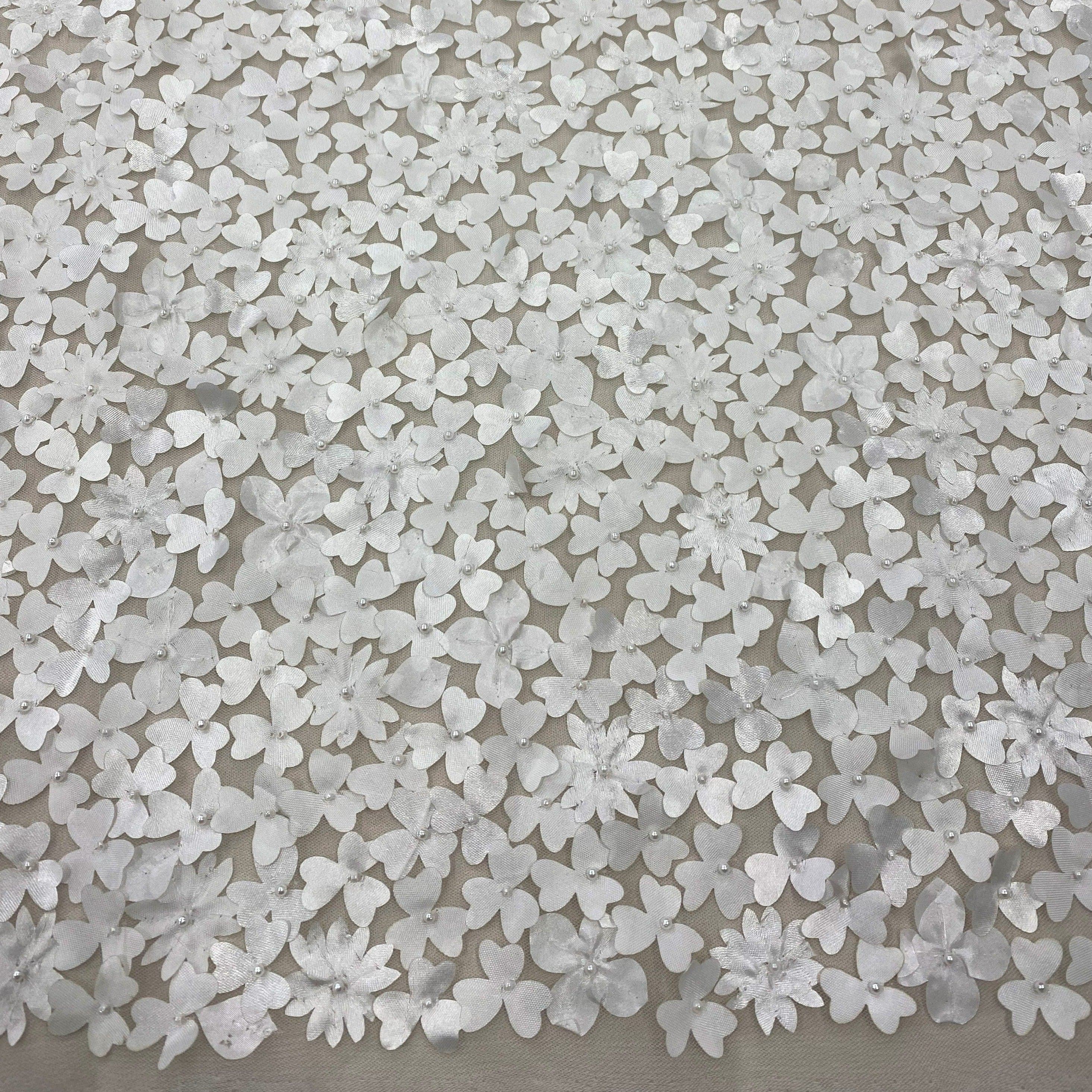 Ivory Floral Embellished Tulle — featuring floral motifs, a 3D floral design and hand-beading, 100% polyamide, 110cm wide